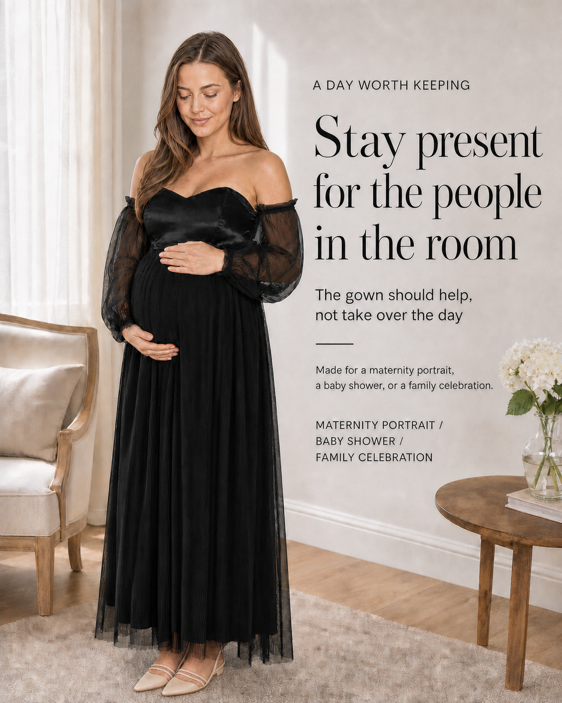 Black maternity gown in a window-lit room with a message about staying present for celebrations.