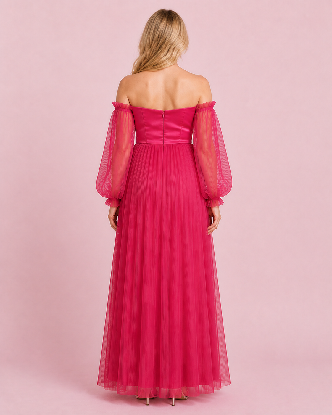 Back view of the fuchsia gown with a paneled bodice, center-back closure and sheer pleated sleeves.
