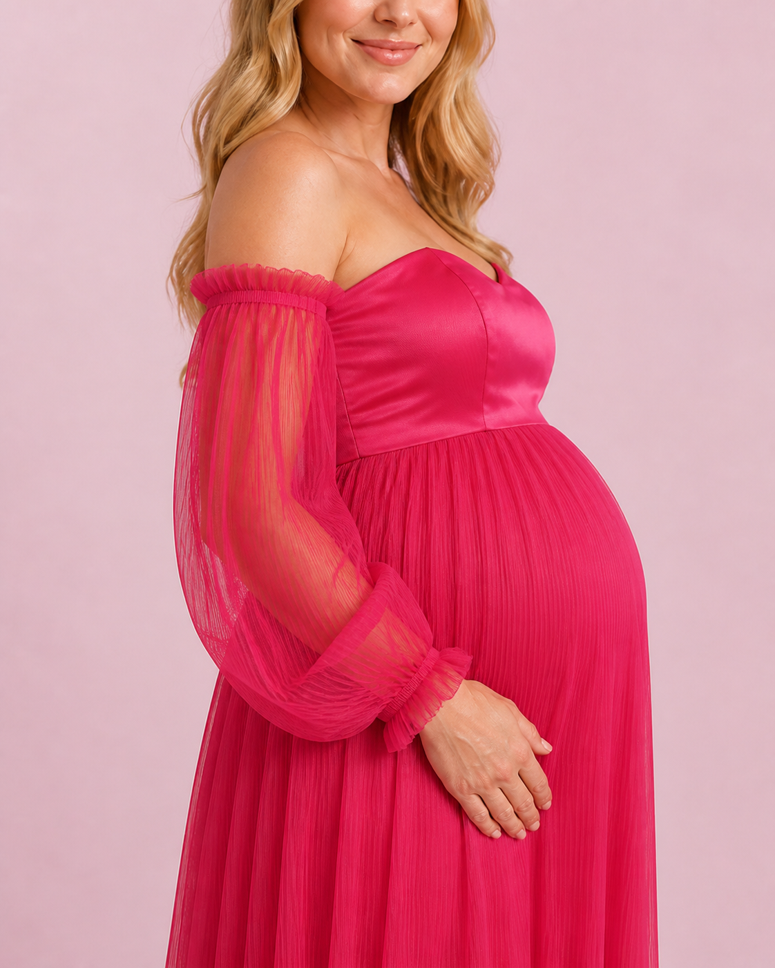 Side detail of the fuchsia gown showing a sheer pleated sleeve and gathered ruffle cuff.