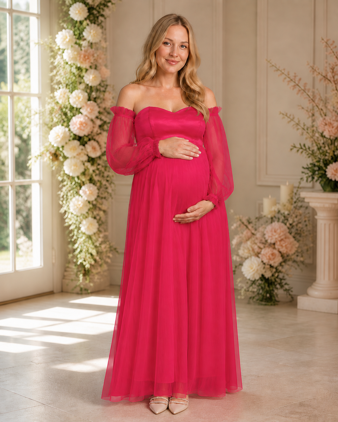 Fuchsia maternity gown styled with cream flats in a sunlit room with floral arrangements.
