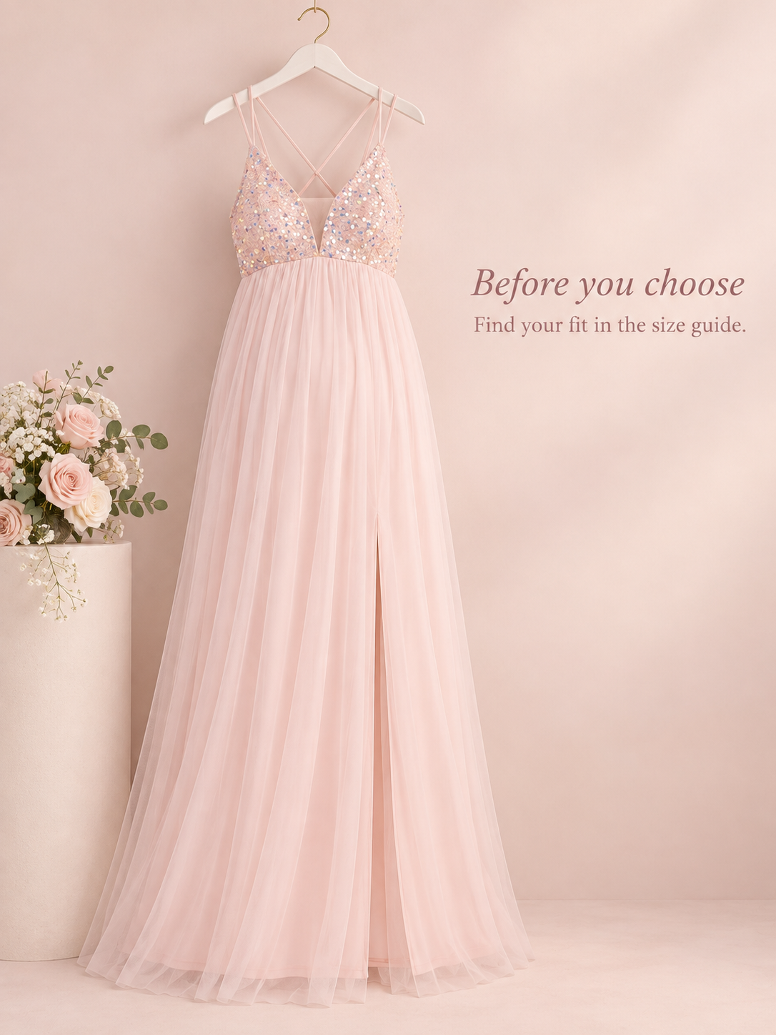 Primrose Blush Pink maternity dress — dress on a hanger with a size guide reminder