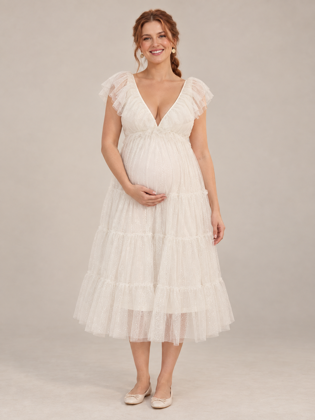 Cosette Ivory maternity dress — front view with deep V-neckline, flutter sleeves and four-tier tulle skirt