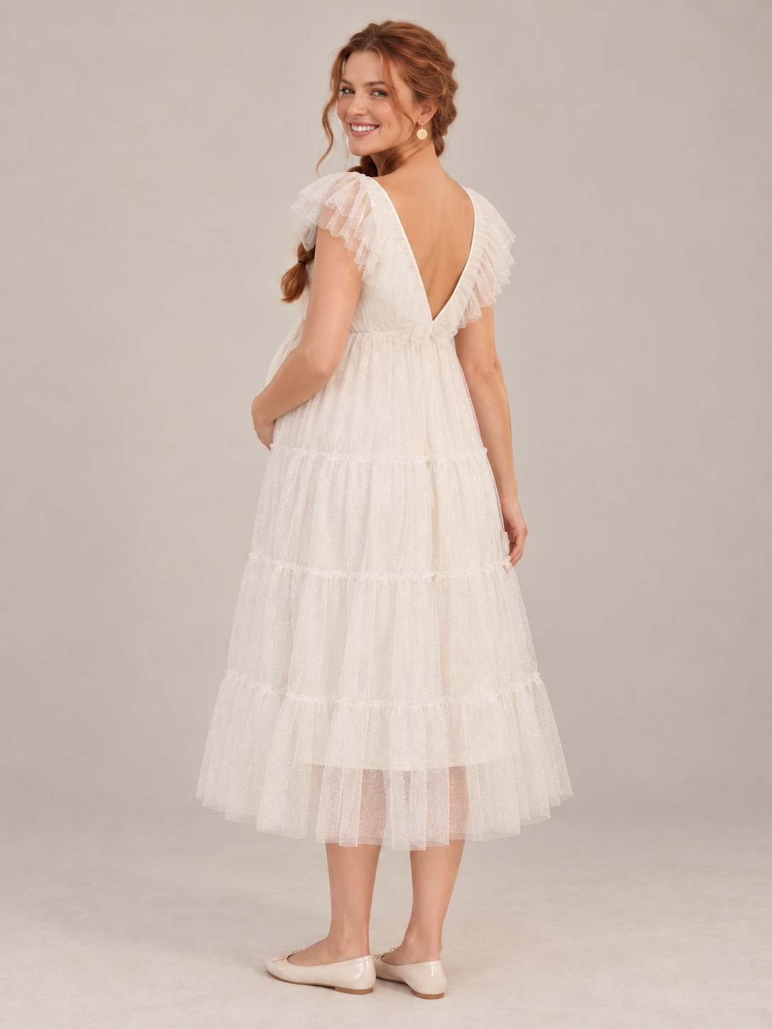 Cosette Ivory maternity dress — back view showing the low V back and flutter sleeves