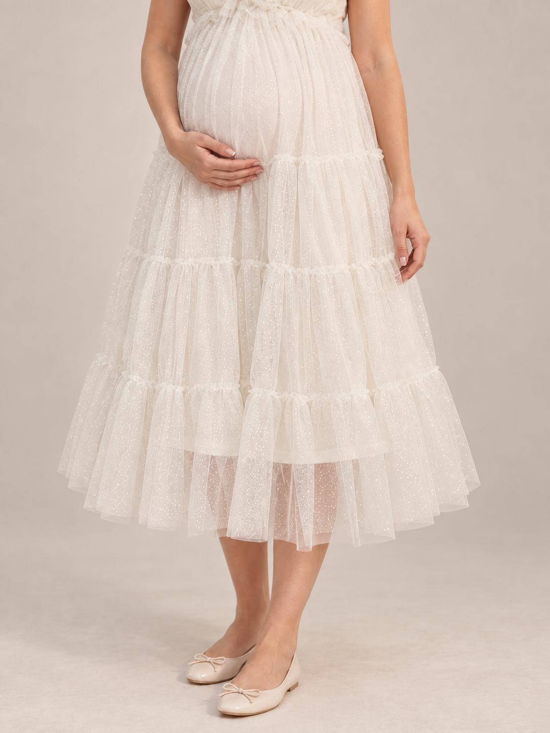 Cosette Ivory maternity dress — gathered tulle tiers and sheer hem at the lower calf