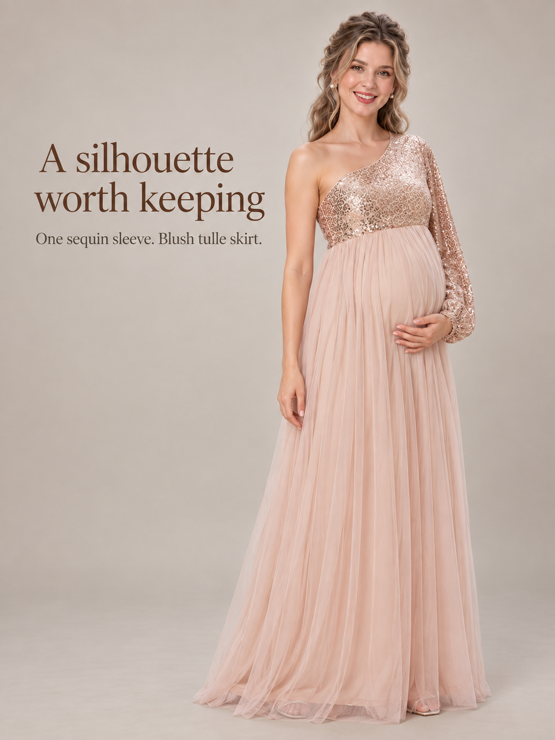 Vivienne Rose Gold maternity dress — full one-shoulder silhouette in soft light