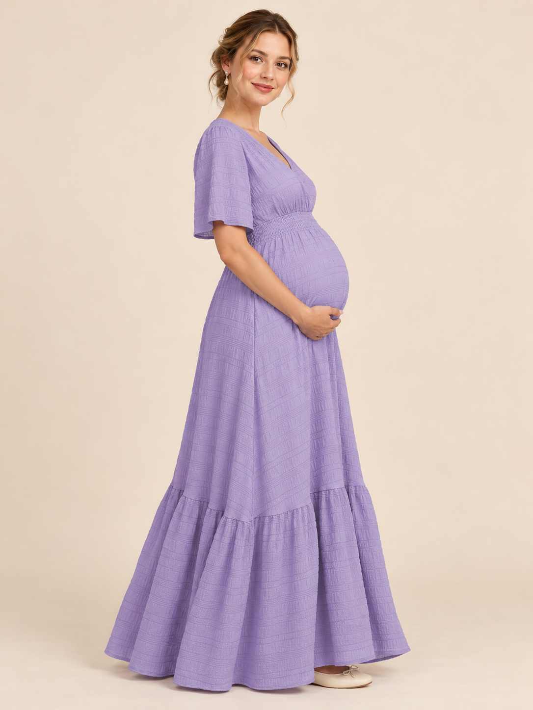 Eugenie Lavender maternity dress — side view of the smocked waistband and flowing skirt