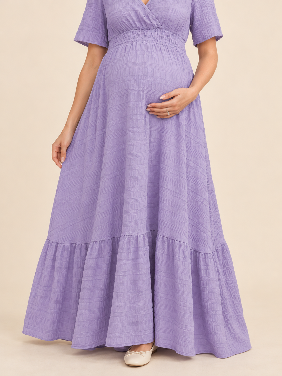 Eugenie Lavender maternity dress — close-up of hands resting on the bump