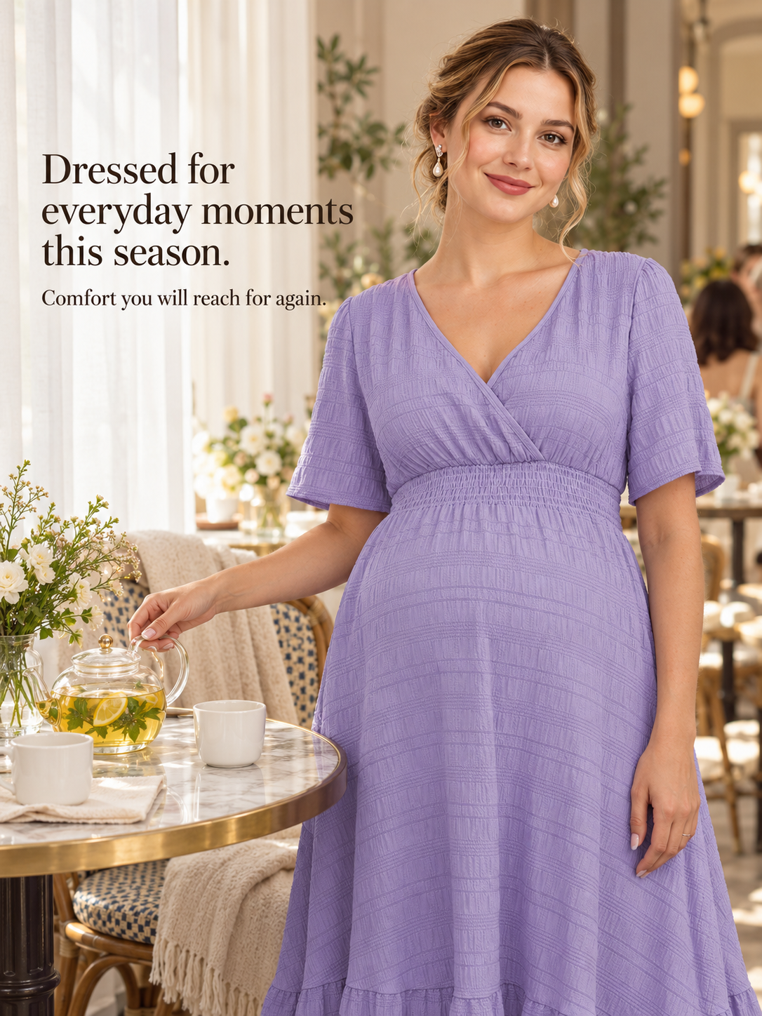 Eugenie Lavender maternity dress — standing at an outdoor cafe table