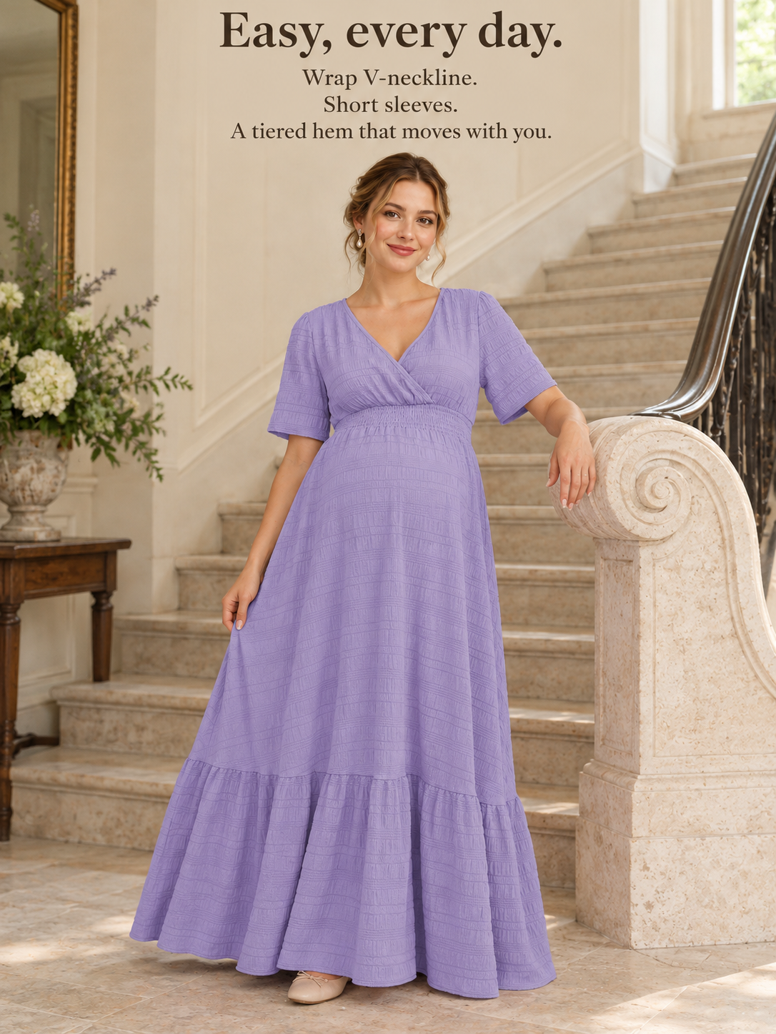 Eugenie Lavender maternity dress — standing on an indoor staircase