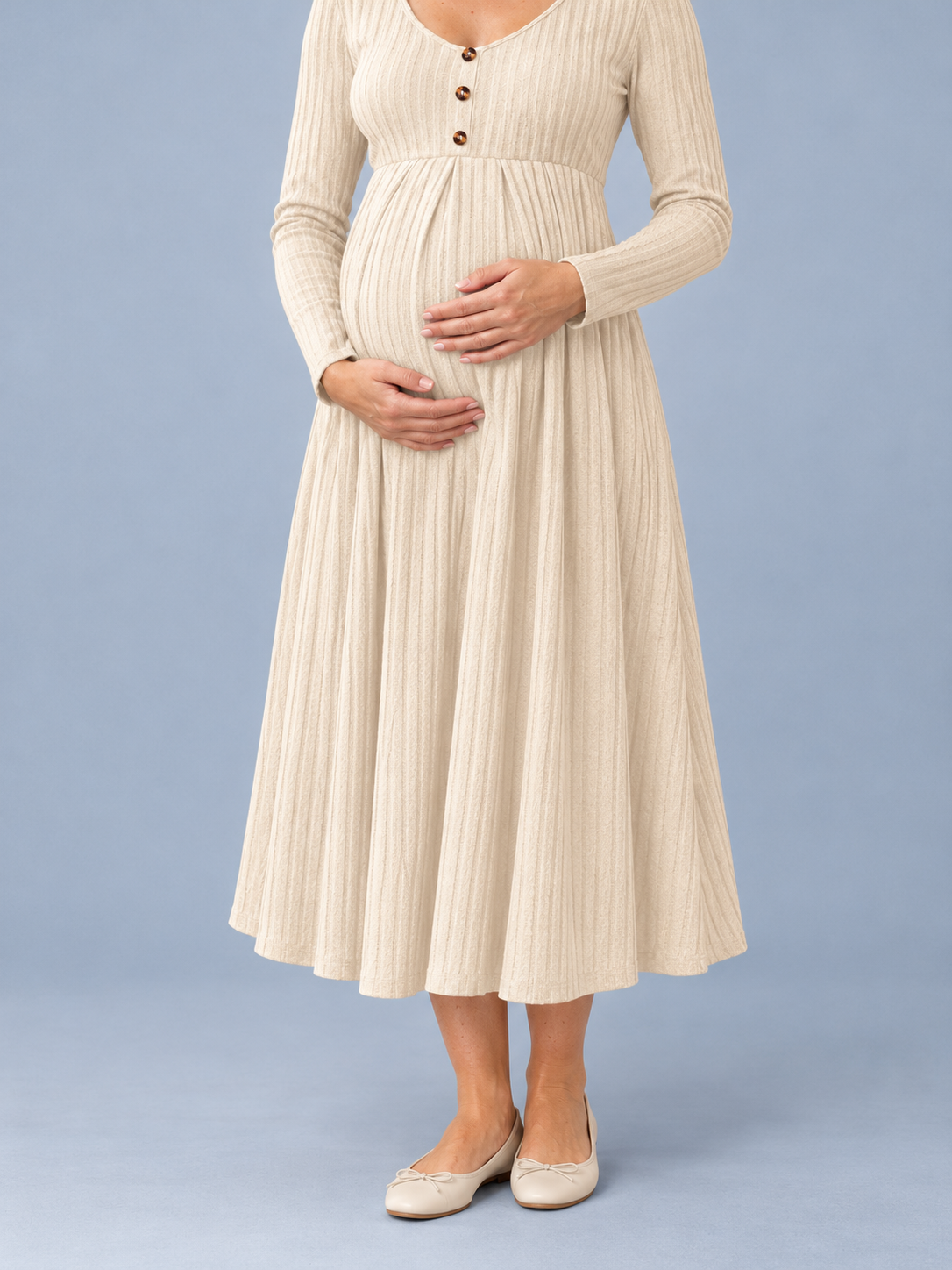 Matilda Apricot maternity dress — close-up of the gathered waist seam over the bump
