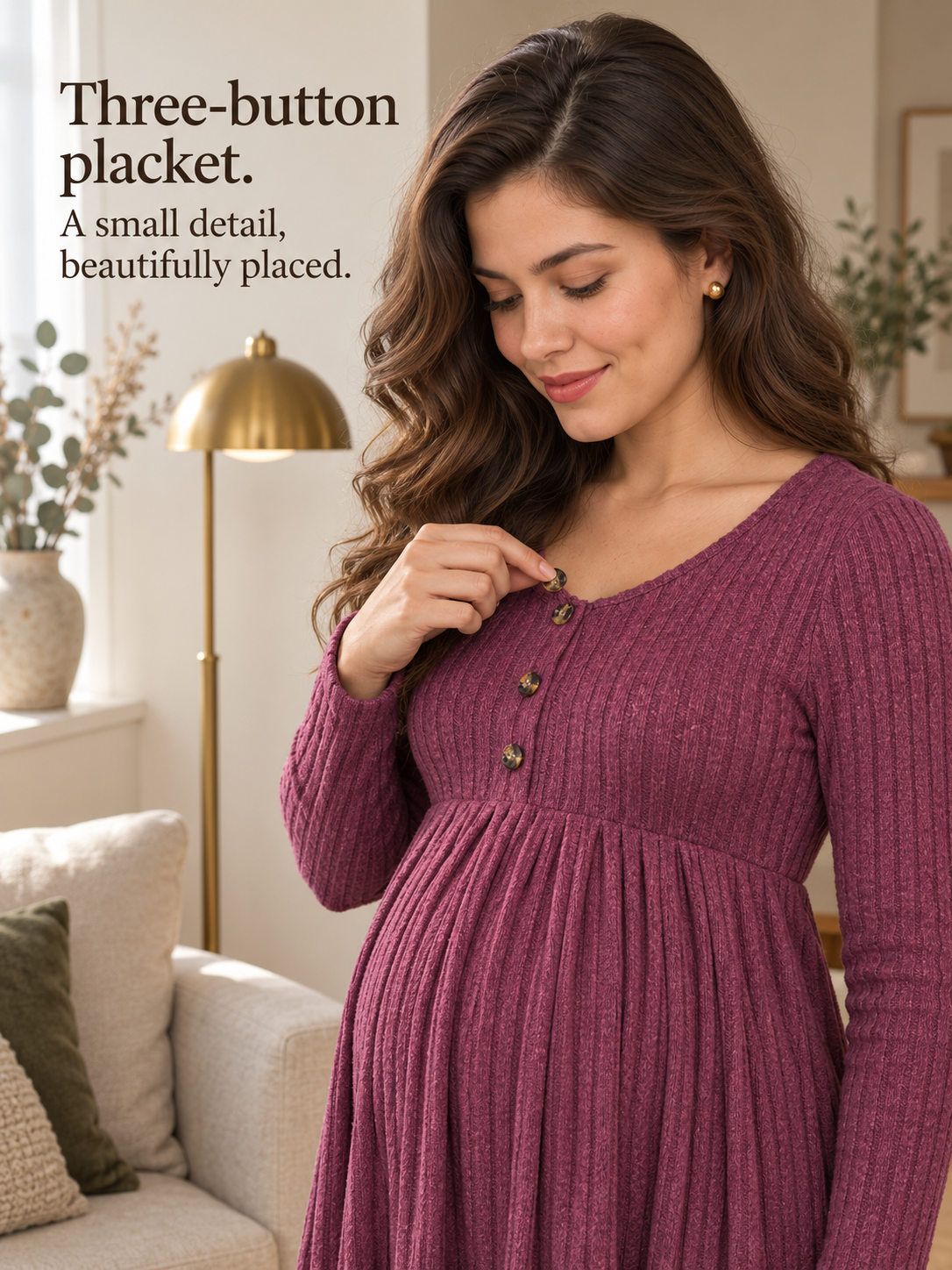 Matilda Wine Red maternity dress — close-up touching the top button of the placket