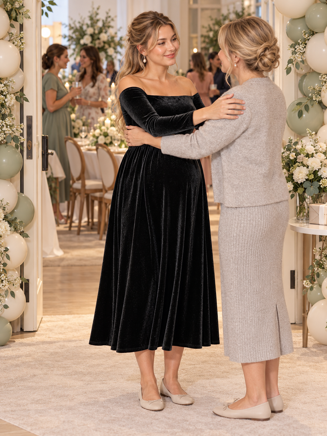 Colette Black maternity dress — embracing a loved one at a balloon-filled celebration