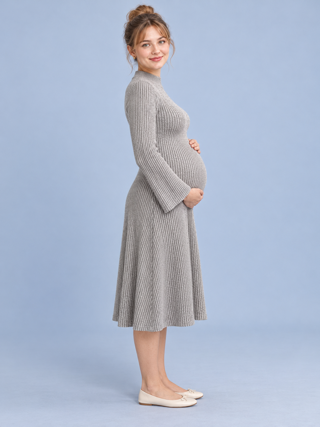 Simone Oatmeal Heather maternity dress — side view showing the maternity silhouette and flared hem