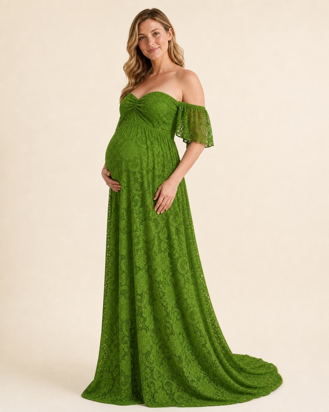 Three-quarter view of the Bright Apple Green empire-waist maternity gown, bump release and flutter lace sleeves