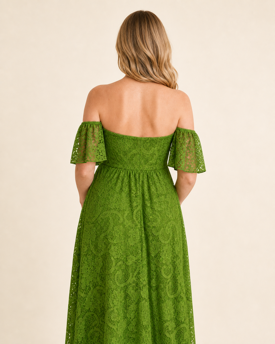 Back of the Bright Apple Green lace maternity maxi, flutter sleeves and a longer floor-extending hem