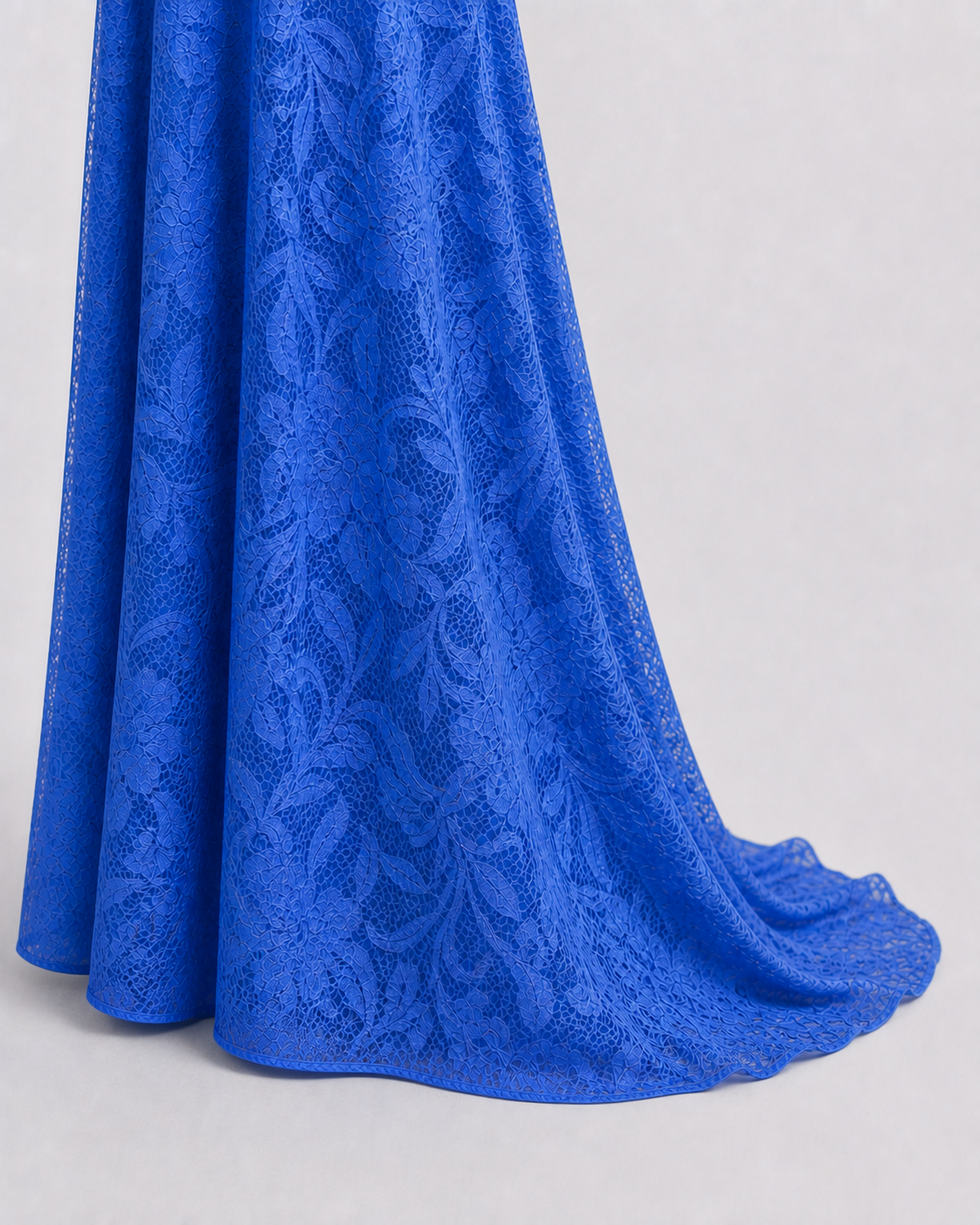 Royal Blue hem at floor level, longer back fabric creating a photographic drape