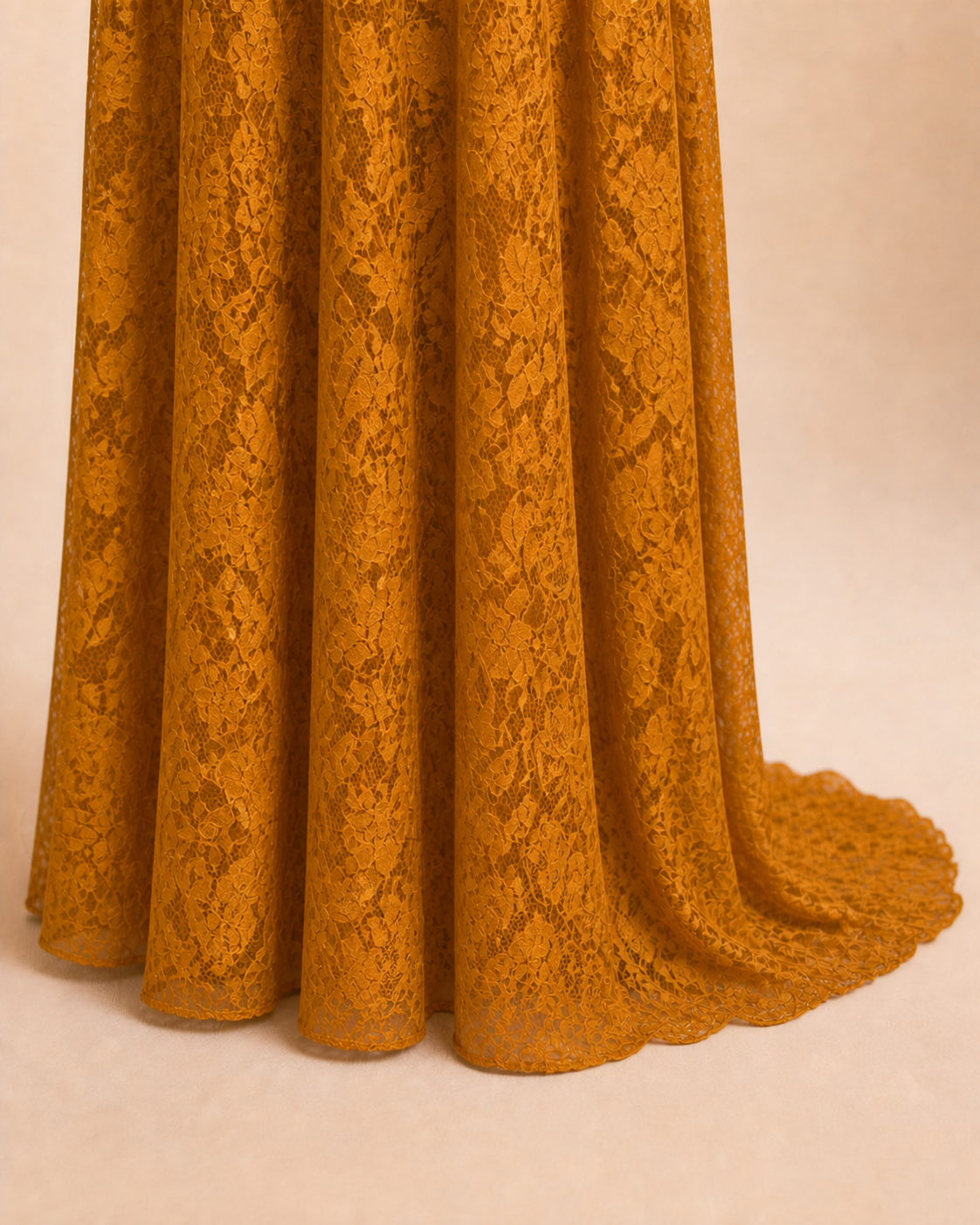 Antique Gold hem meeting the floor, longer back fabric in a natural open fall
