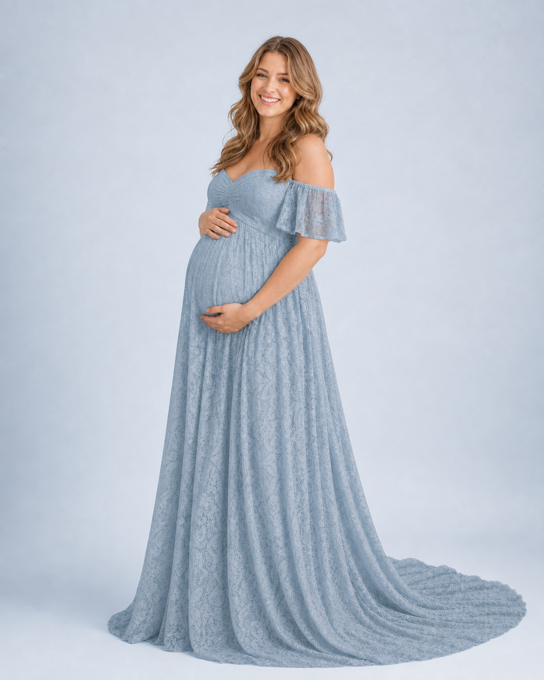 Misty Blue three-quarter view, empire waist and a soft A-line over the bump