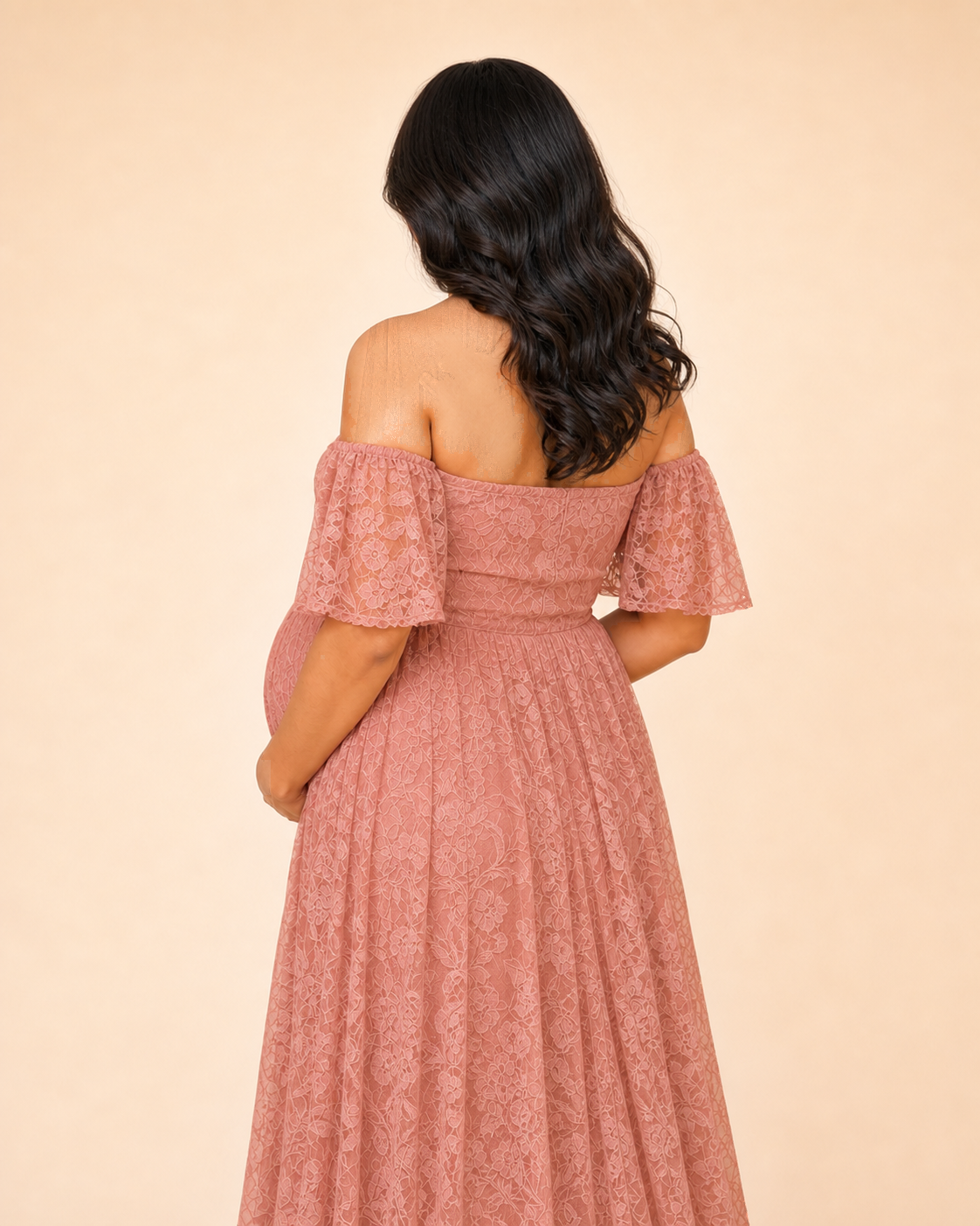 Soft Blush Pink back view, flutter sleeves and a longer hem behind the blush maxi