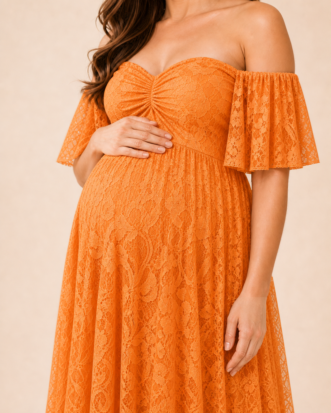 Ginger-orange floral lace close-up, small-to-medium blooms on a warm mesh ground