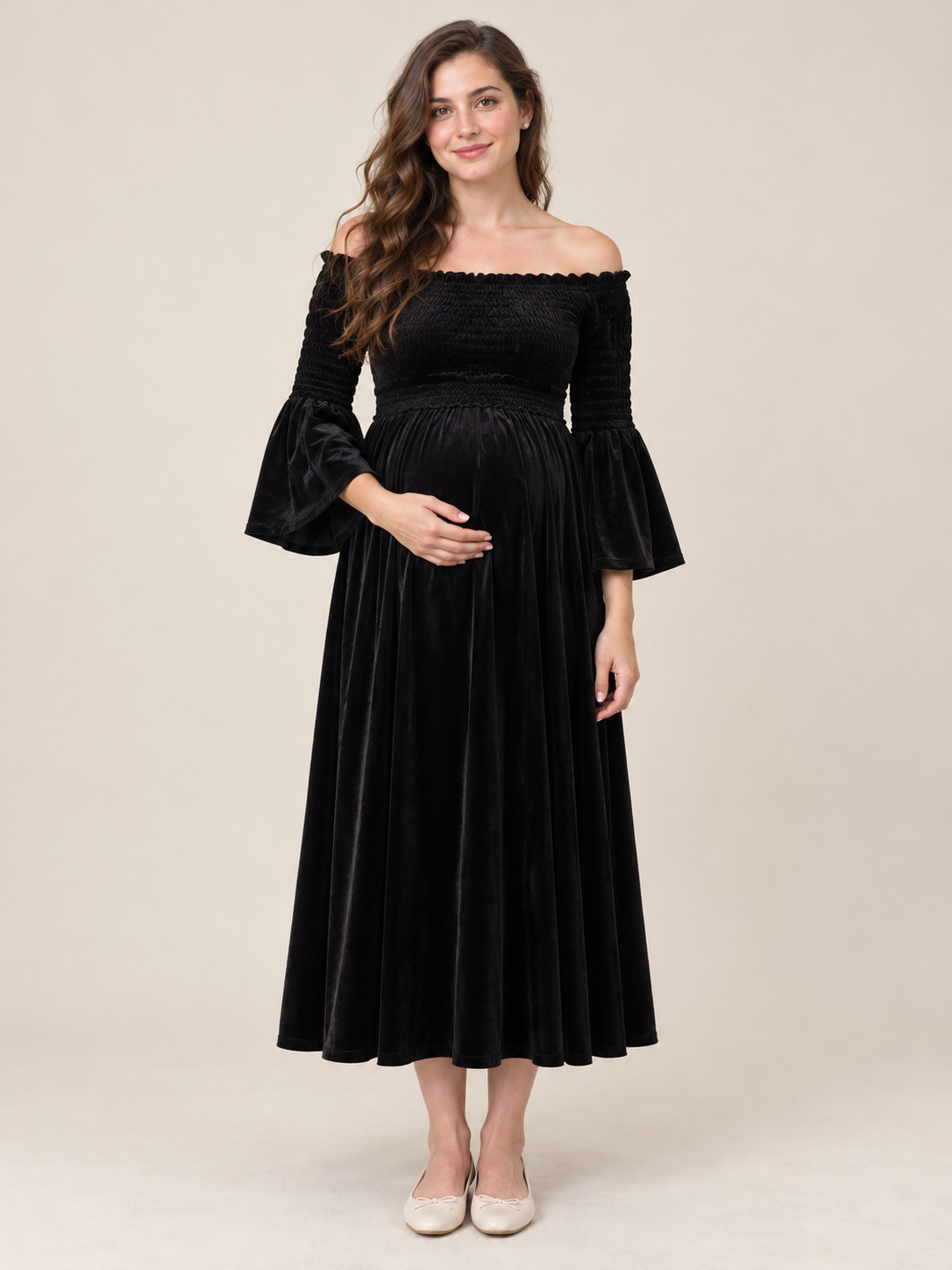 Talia Black maternity dress — front view with off-shoulder smocked bodice and bell sleeves