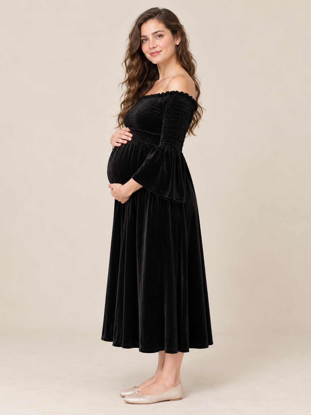 Talia Black maternity dress — side profile showing the fitted bodice and bump
