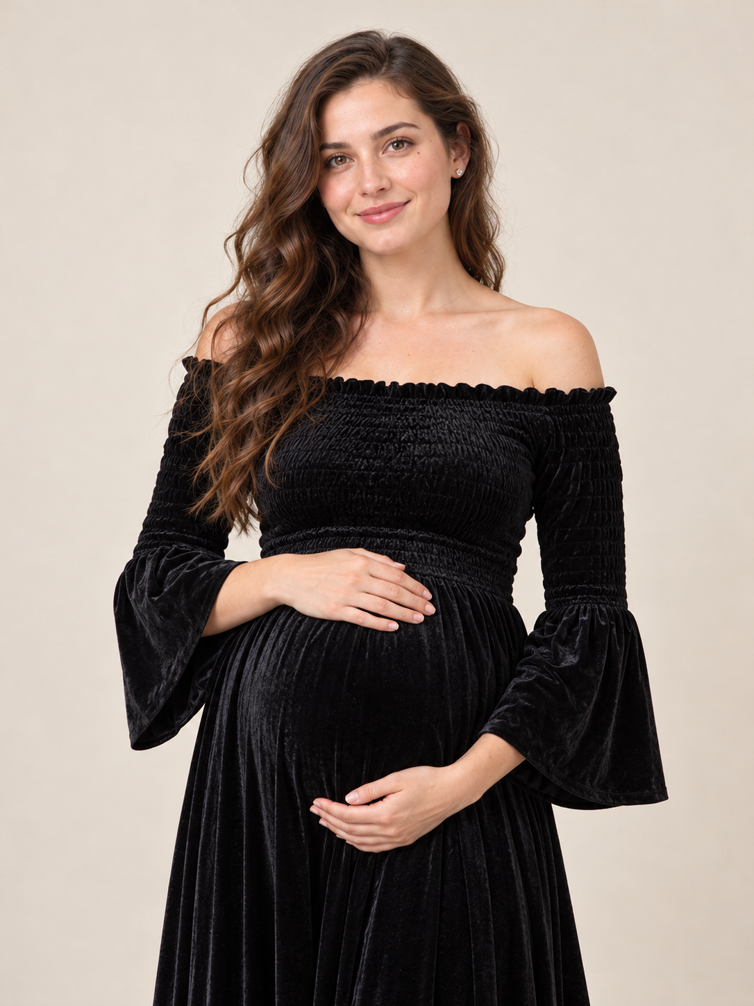Talia Black maternity dress — off-shoulder neckline and smocked bodice close-up, smiling