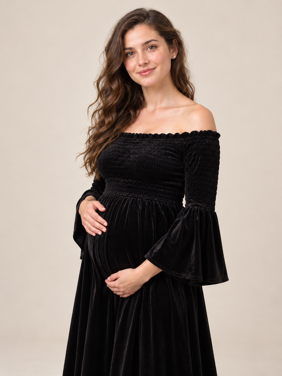 Talia Black maternity dress — close-up front view with bell sleeve and smocked waist