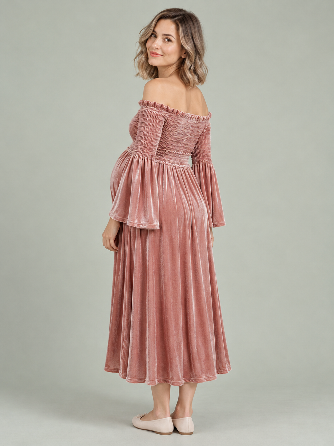 Talia Dusty Rose maternity dress — three-quarter back view of the smocked bodice and bell sleeves