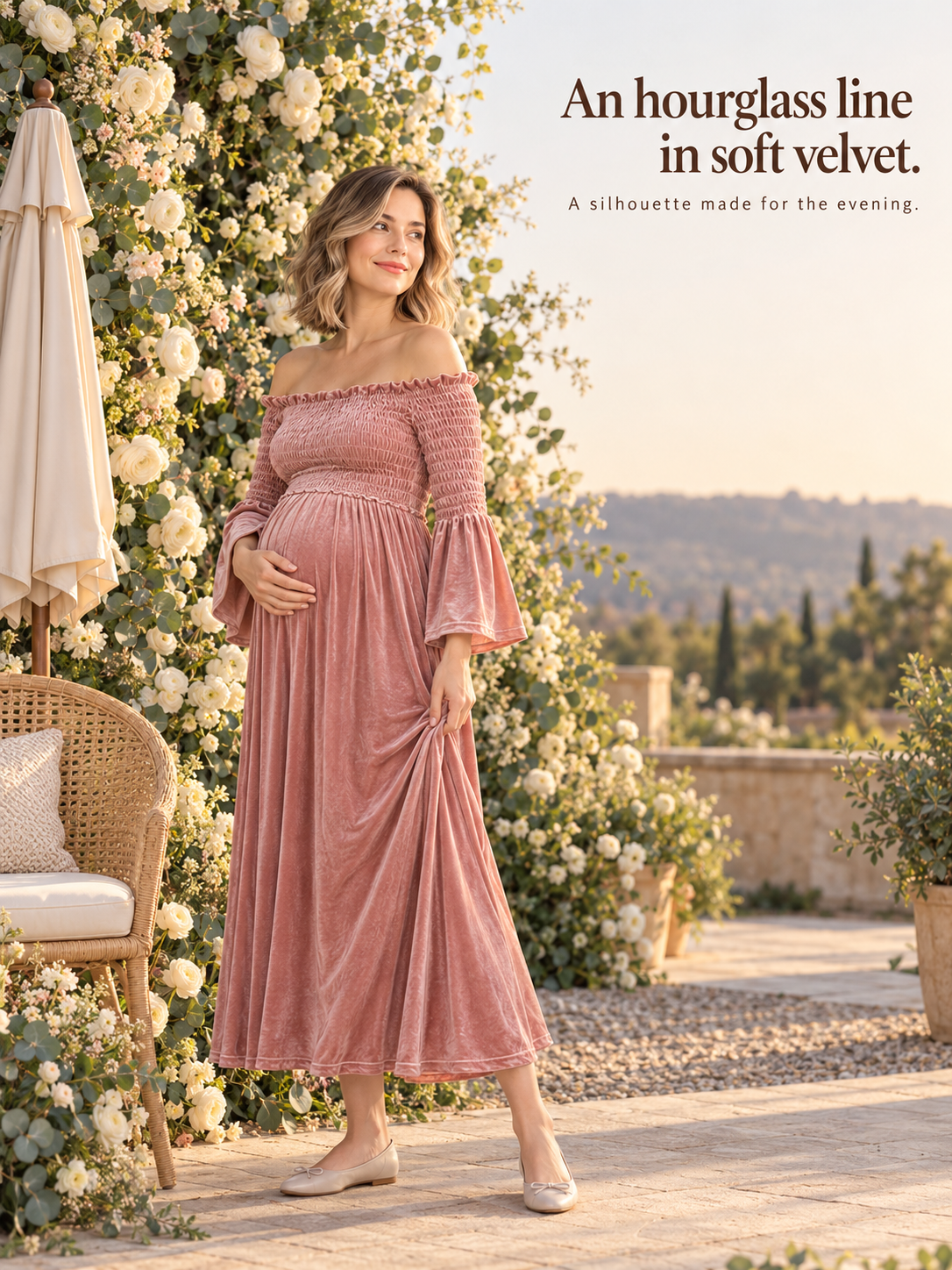 Talia Dusty Rose maternity dress — walking through a rose-covered pergola at golden hour