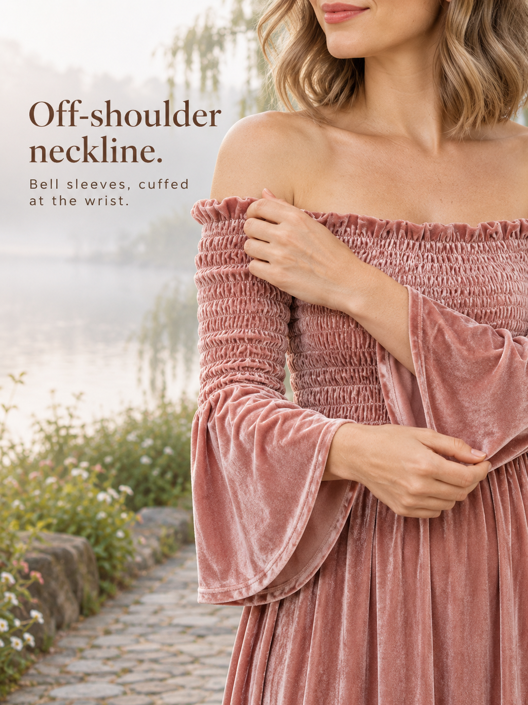 Talia Dusty Rose maternity dress — touching the bell sleeve cuff beside a lake