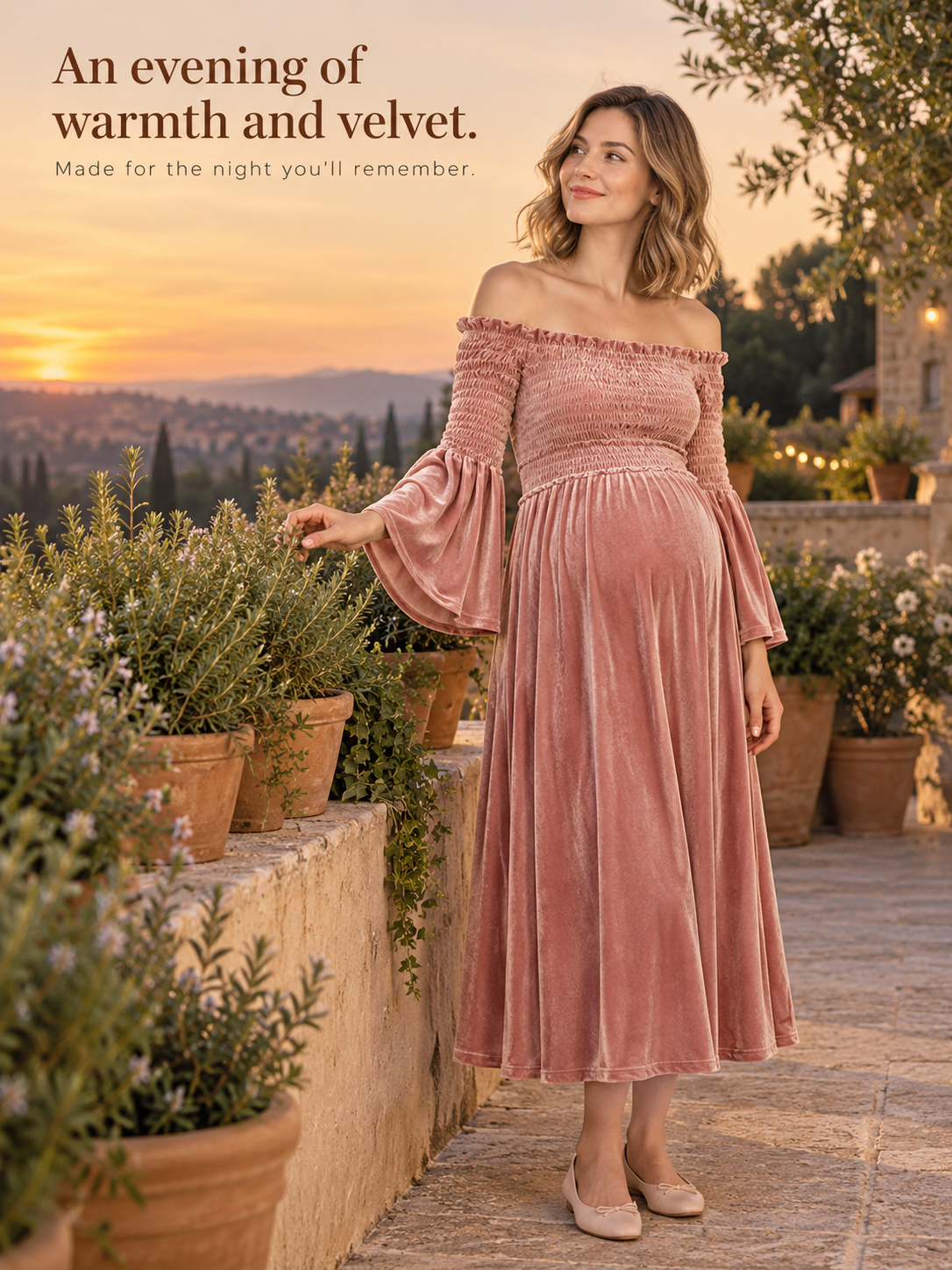 Talia Dusty Rose maternity dress — leaning on a railing at a hillside sunset