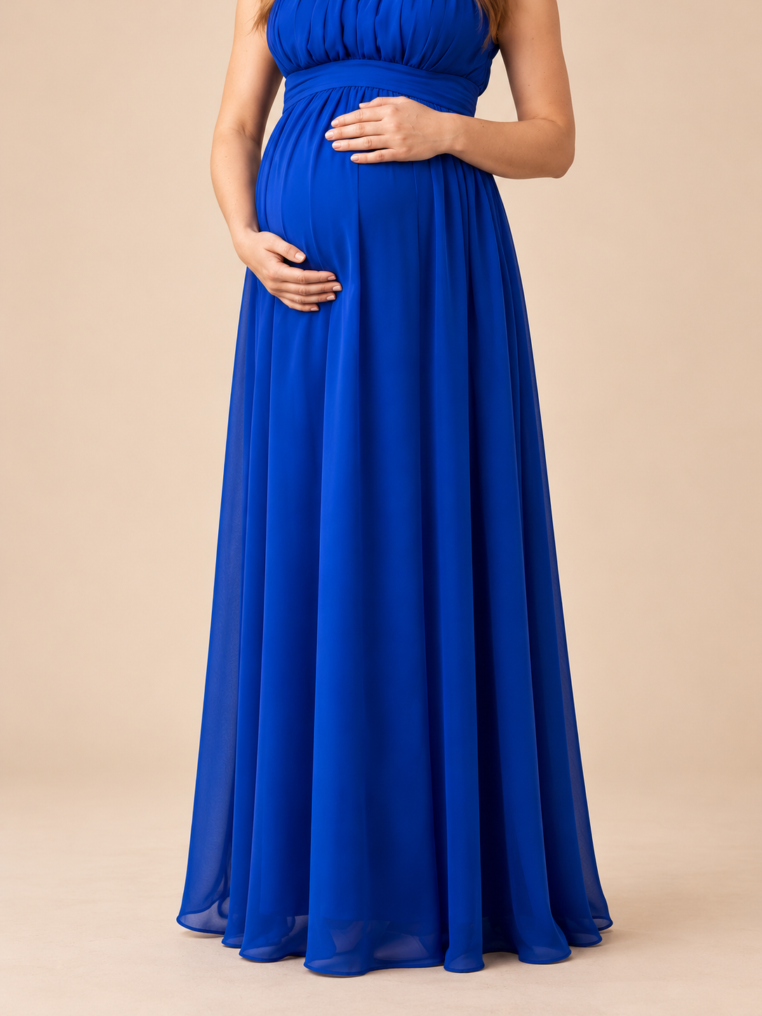 Annelise Royal Blue maternity dress — close-up of hands resting on the bump