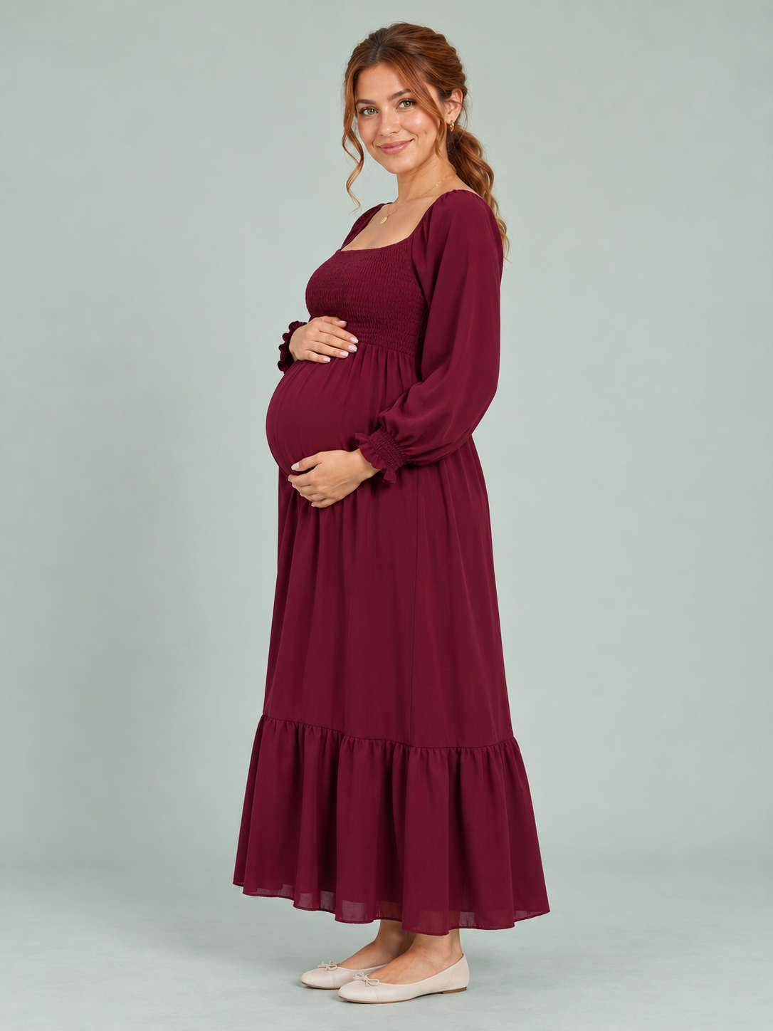 Cecily Wine Red maternity dress — side view of the silhouette and maternity bump