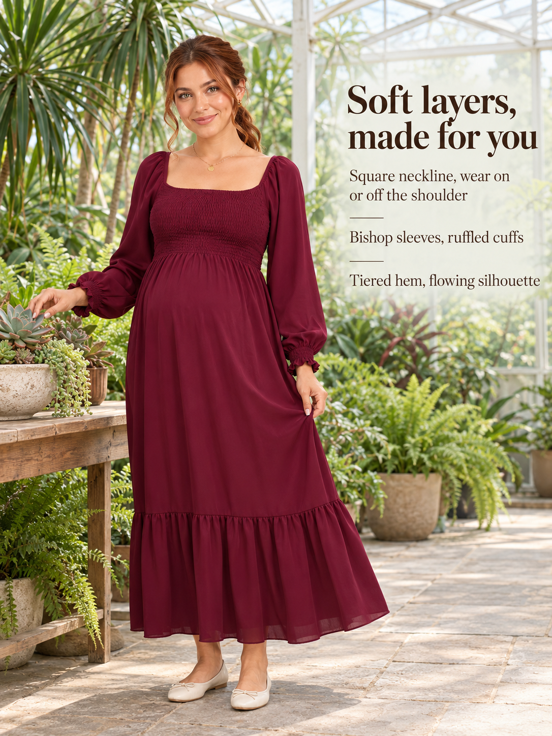Cecily Wine Red maternity dress — standing indoors near potted plants and a mirror