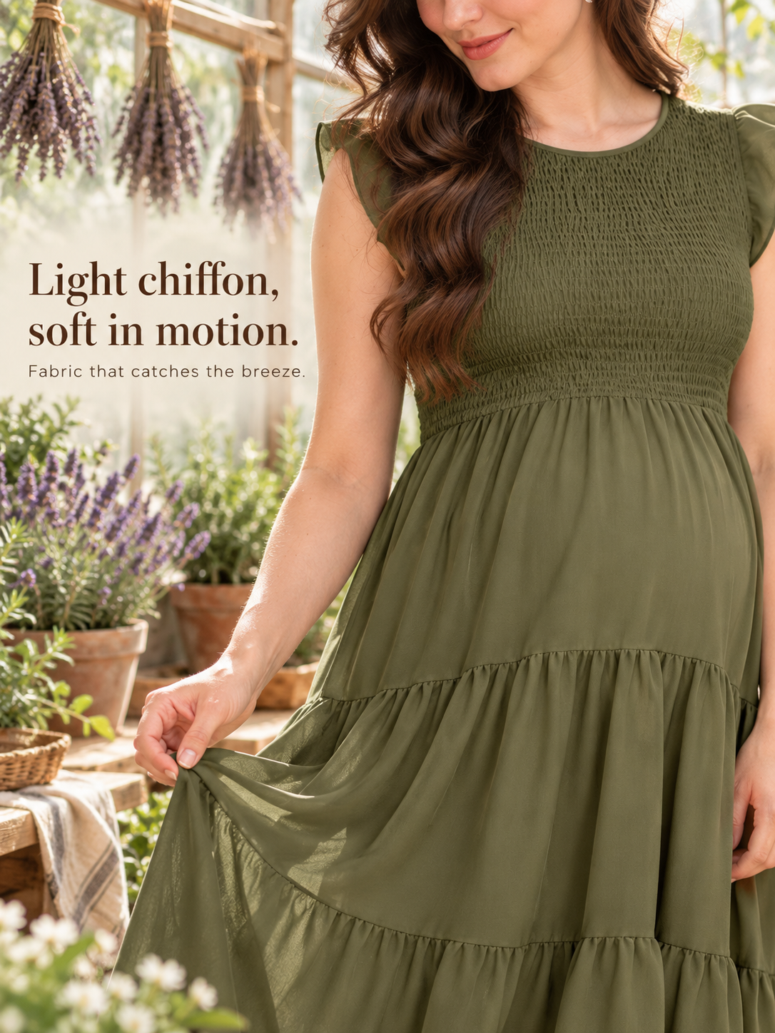 Lisette Olive Green maternity dress — walking past hanging lavender bunches