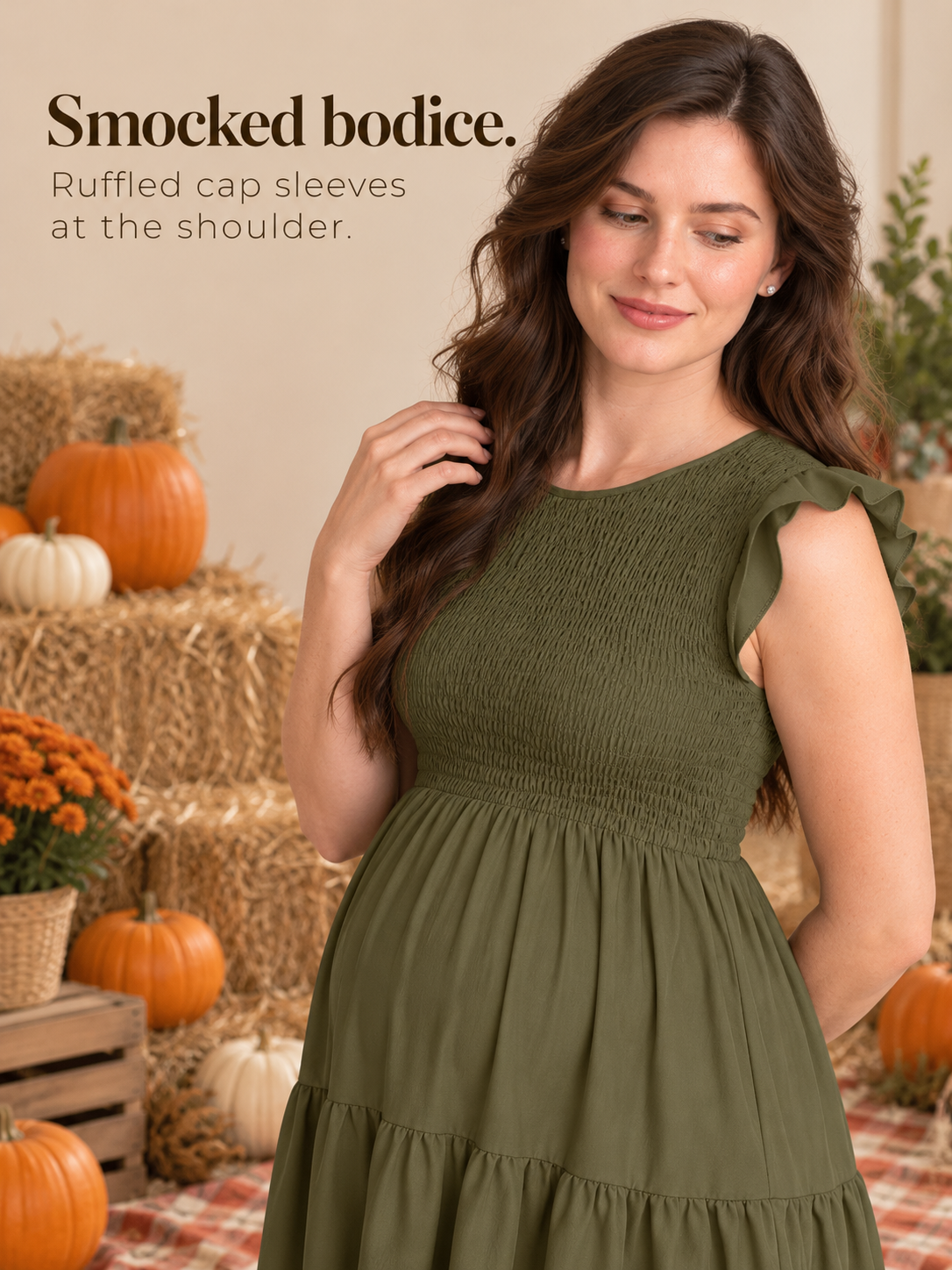 Lisette Olive Green maternity dress — close-up of the smocked bodice, hand near the collar