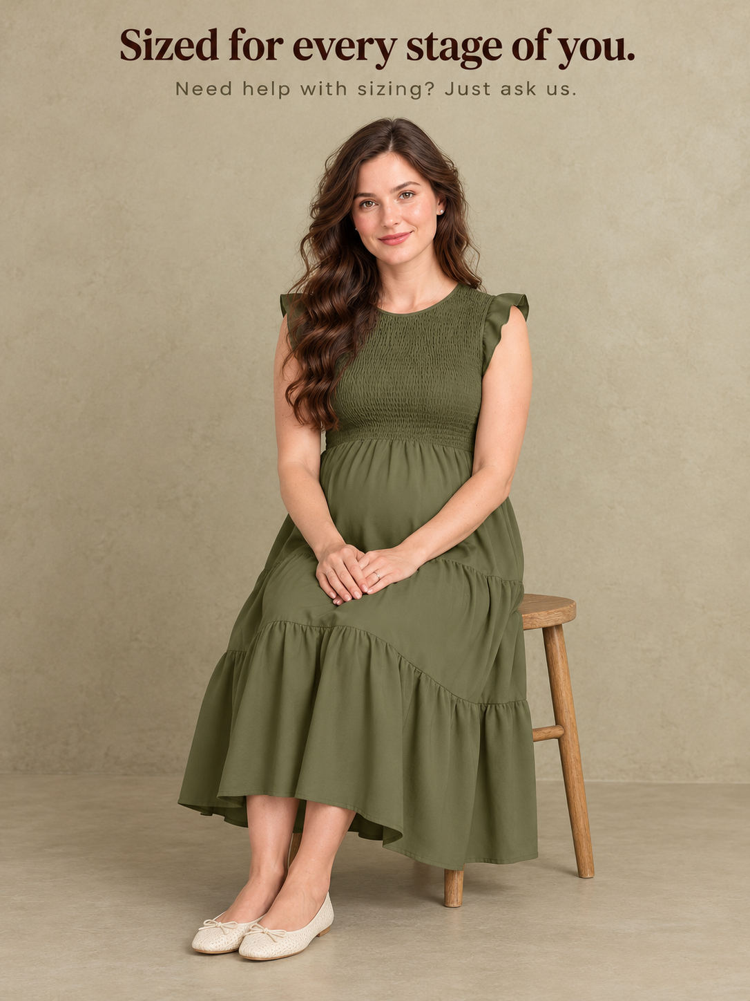 Lisette Olive Green maternity dress — standing portrait against a plain wall