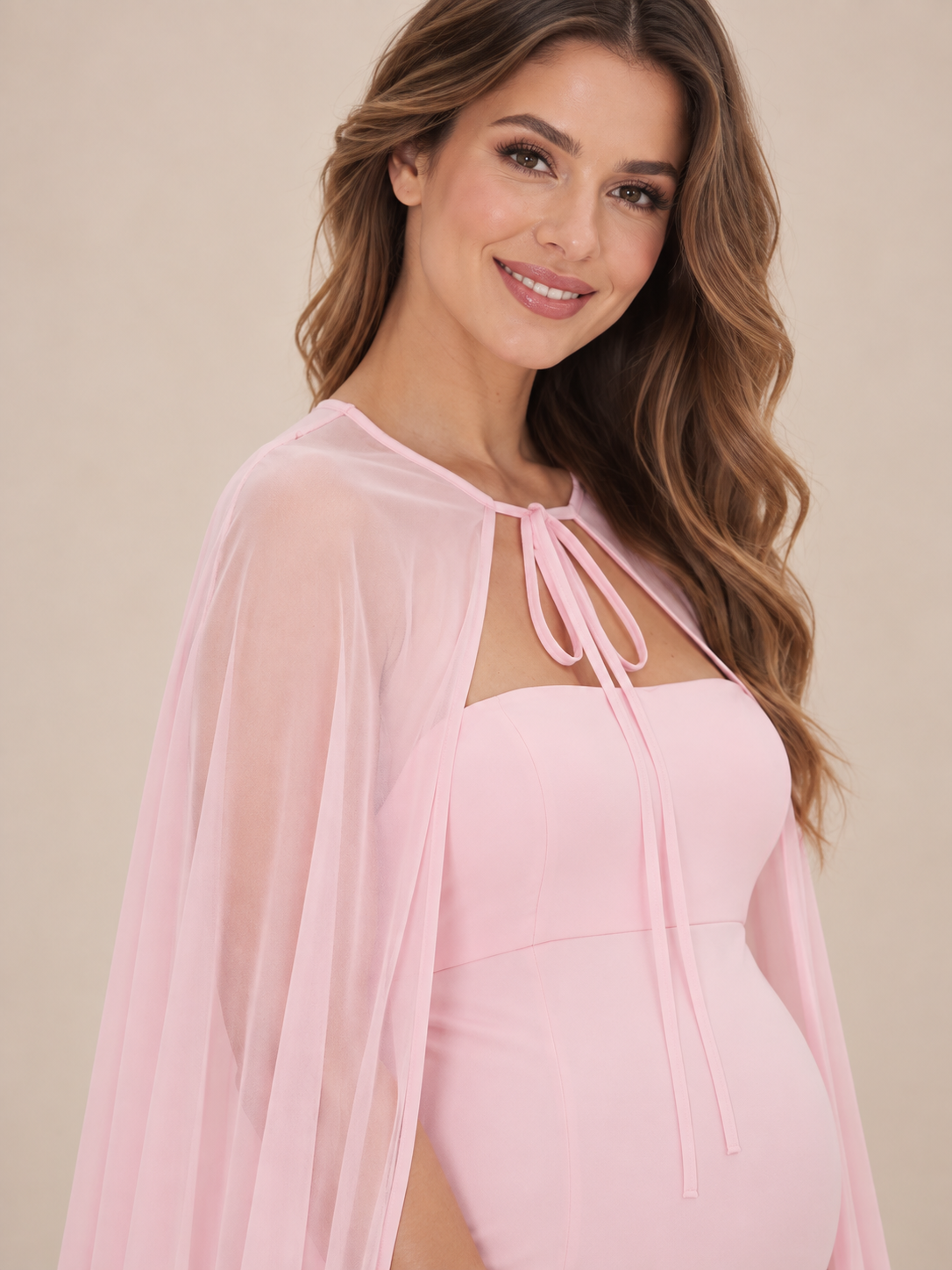 Rosamund Light Pink maternity dress — sheer cape over the shoulder with slim bow tie detail
