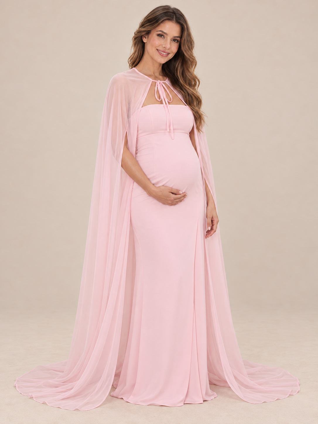 Rosamund Light Pink maternity dress — fitted floor-length skirt with the cape sweeping the floor