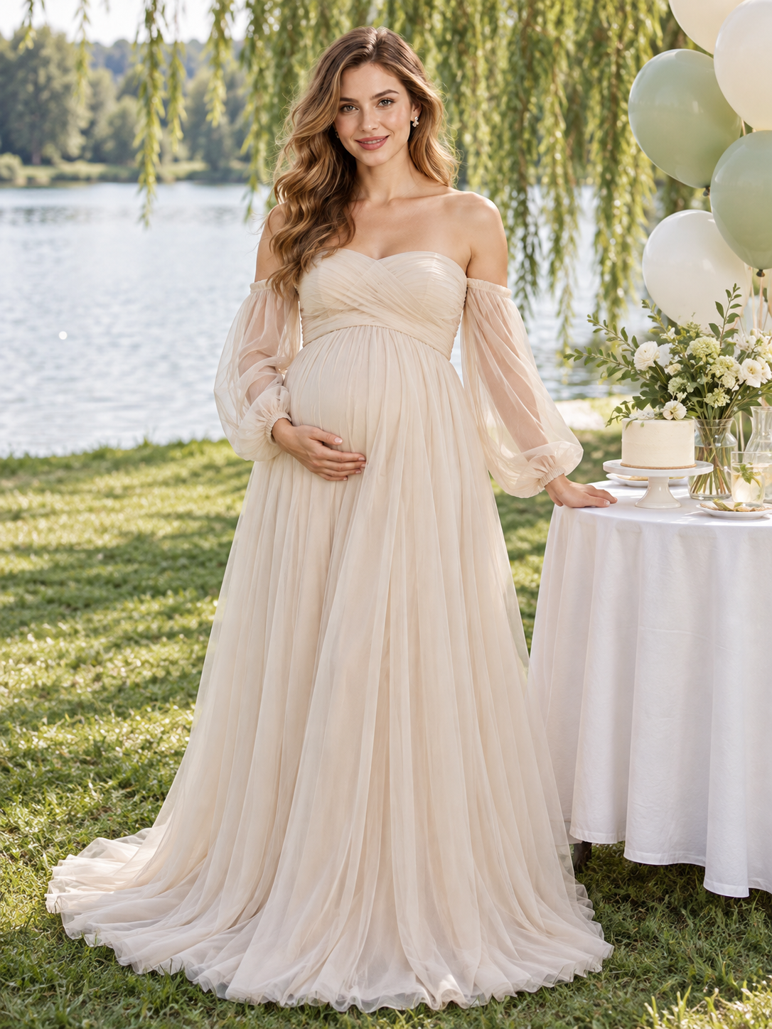 Anouk Champagne maternity dress — lakeside portrait beside a cake table under willow trees
