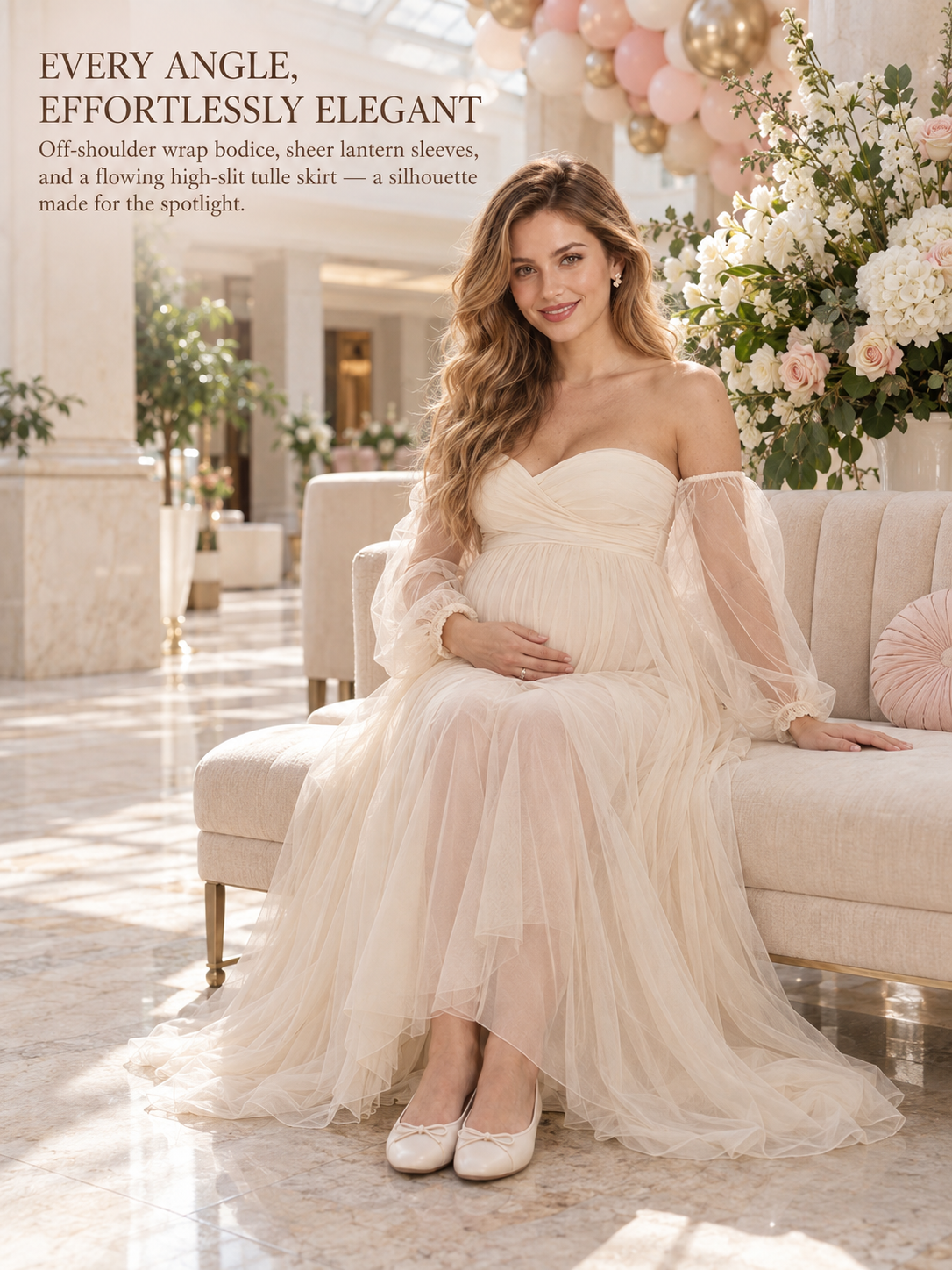 Anouk Champagne maternity dress — seated on a sofa in a bright hall with the tulle skirt spread out