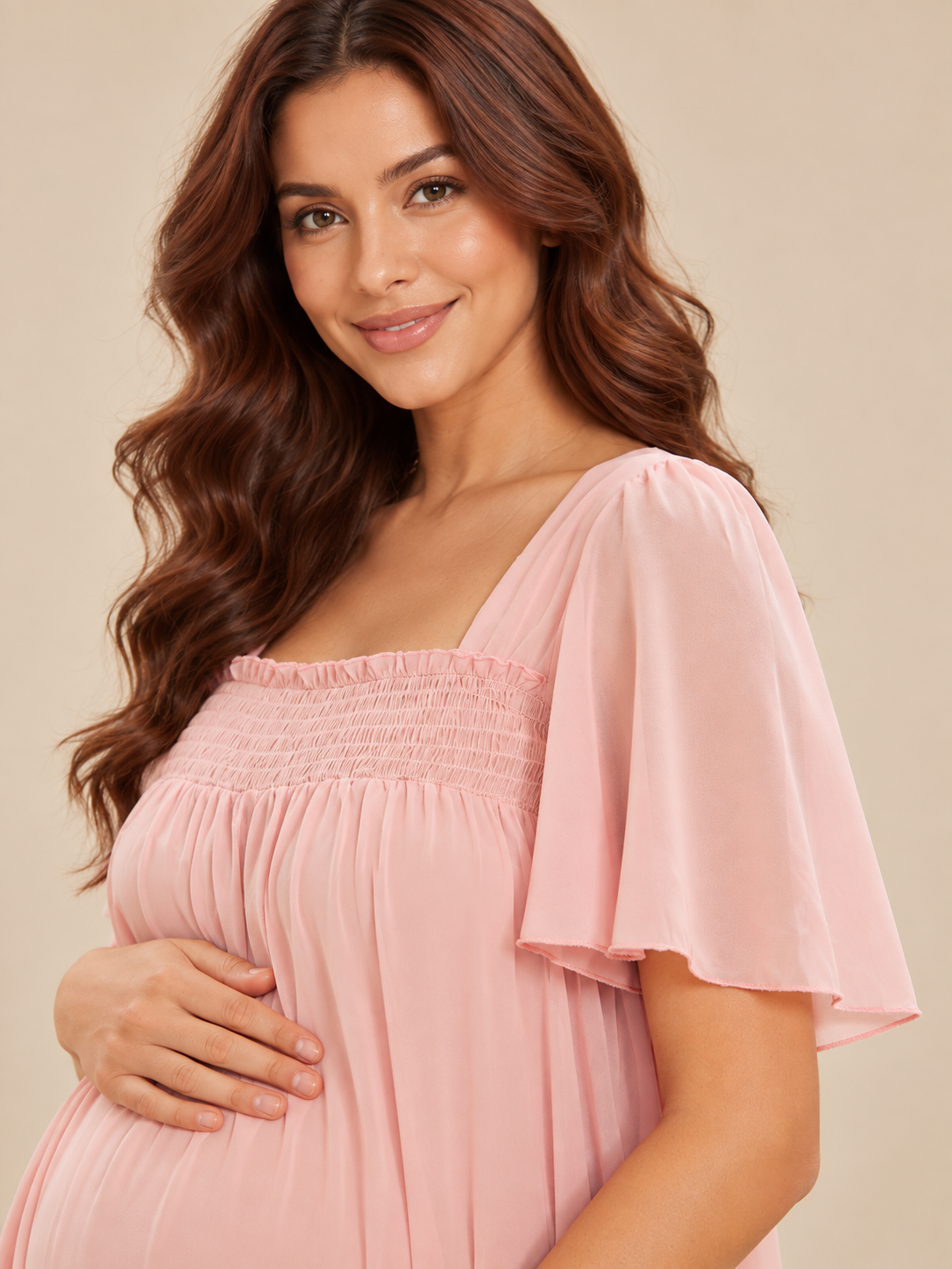 Felicity Blush Pink maternity dress — short flutter sleeve falling loosely over the upper arm