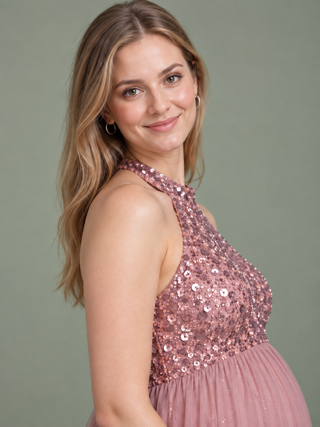Evelina Dusty Pink maternity dress — bare shoulder and sequin bodice from a three-quarter angle