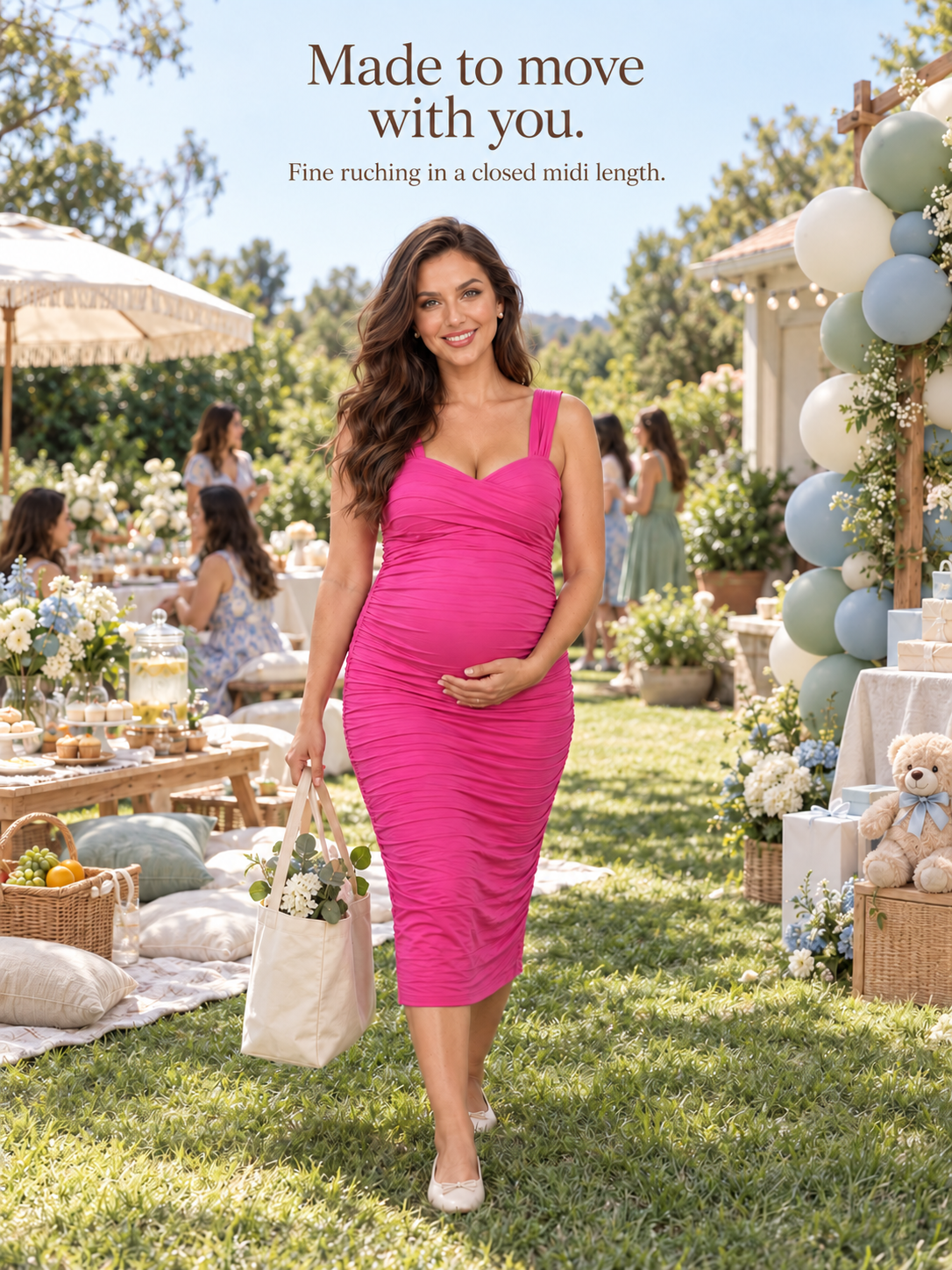 Paloma Rose maternity dress — walking across a lawn picnic with a tote bag