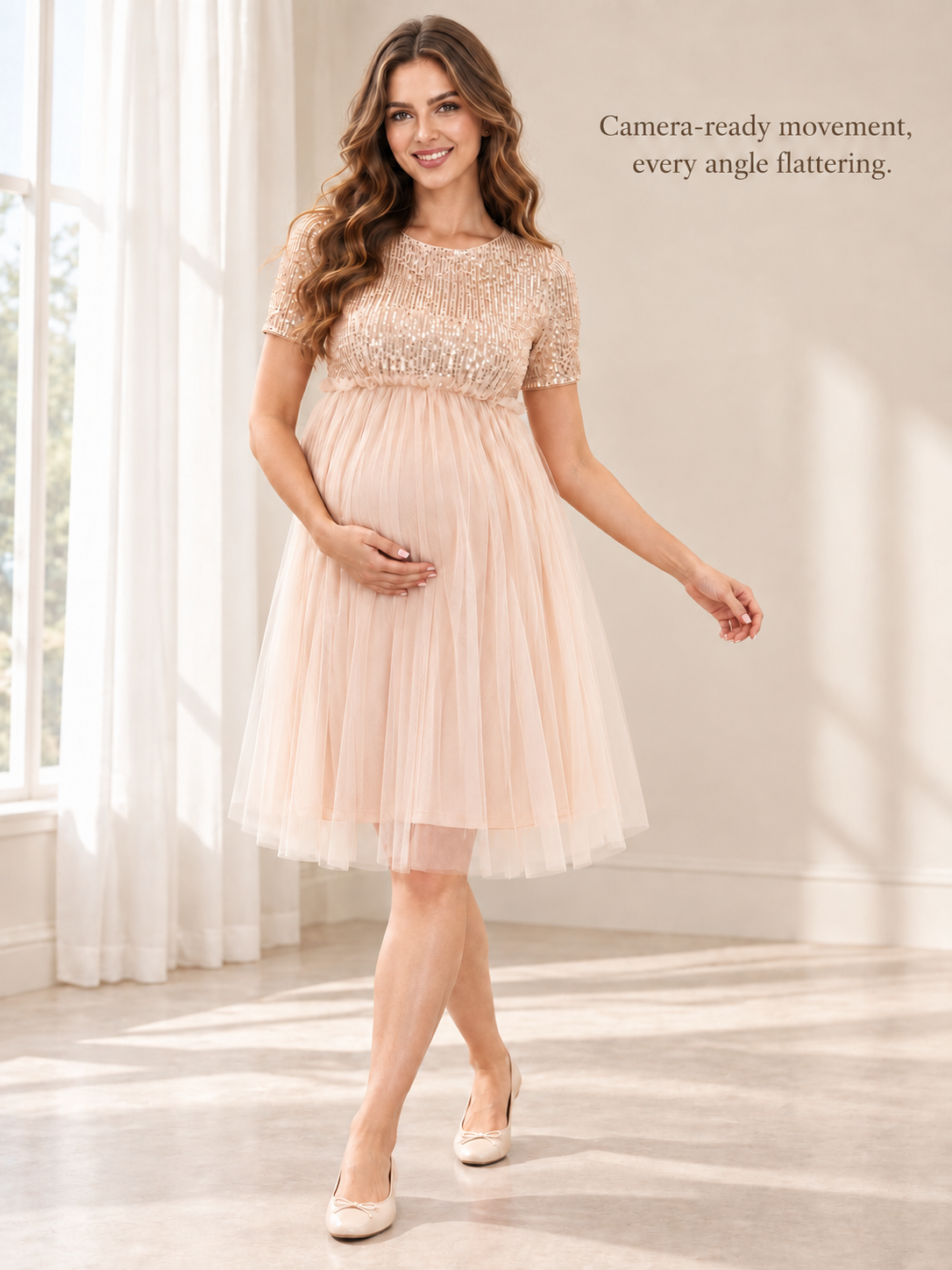 Margot Champagne maternity dress — full silhouette in mid-step in soft light