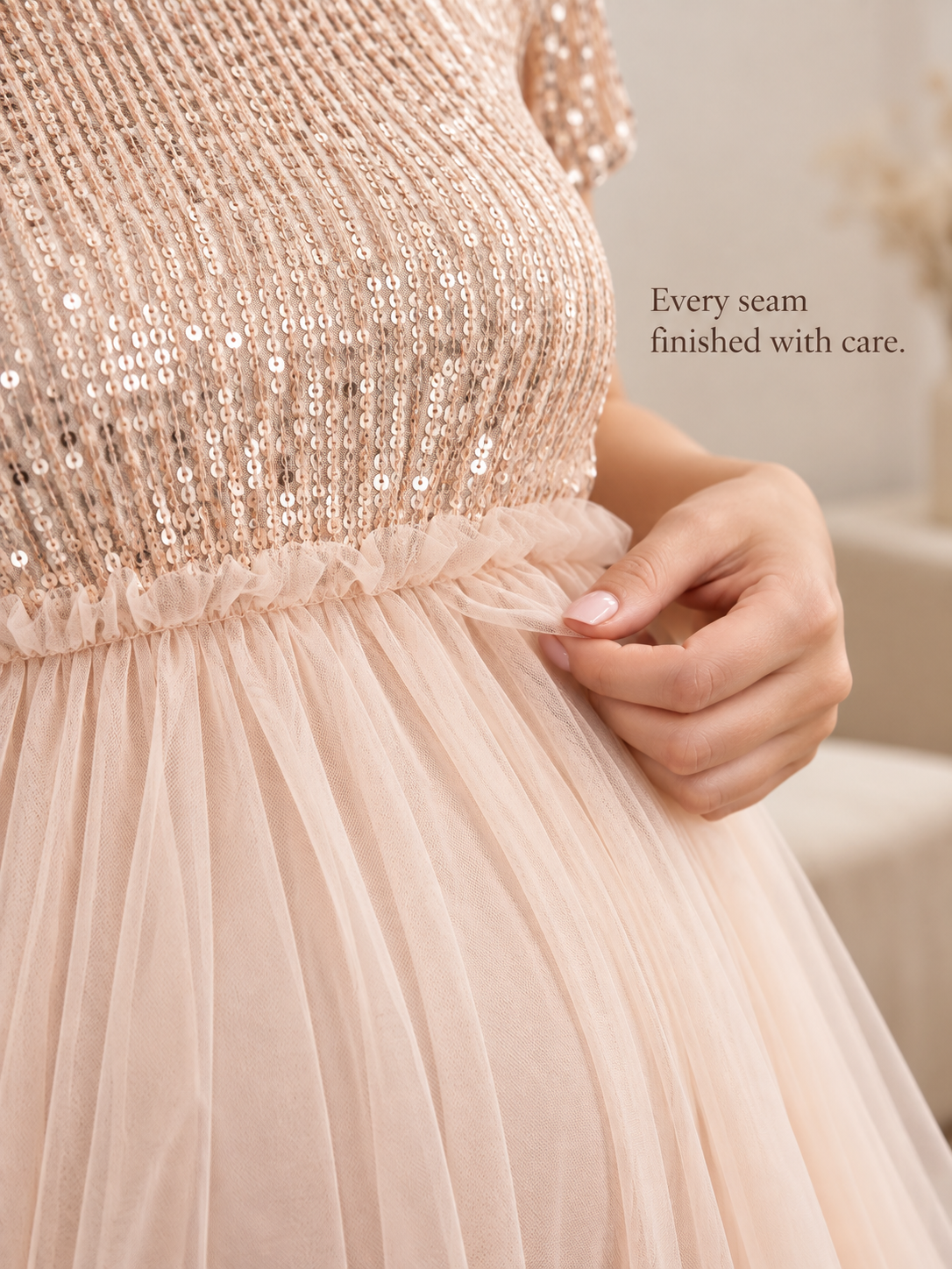 Margot Champagne maternity dress — sequin bodice and tulle ruffle at the waist close-up