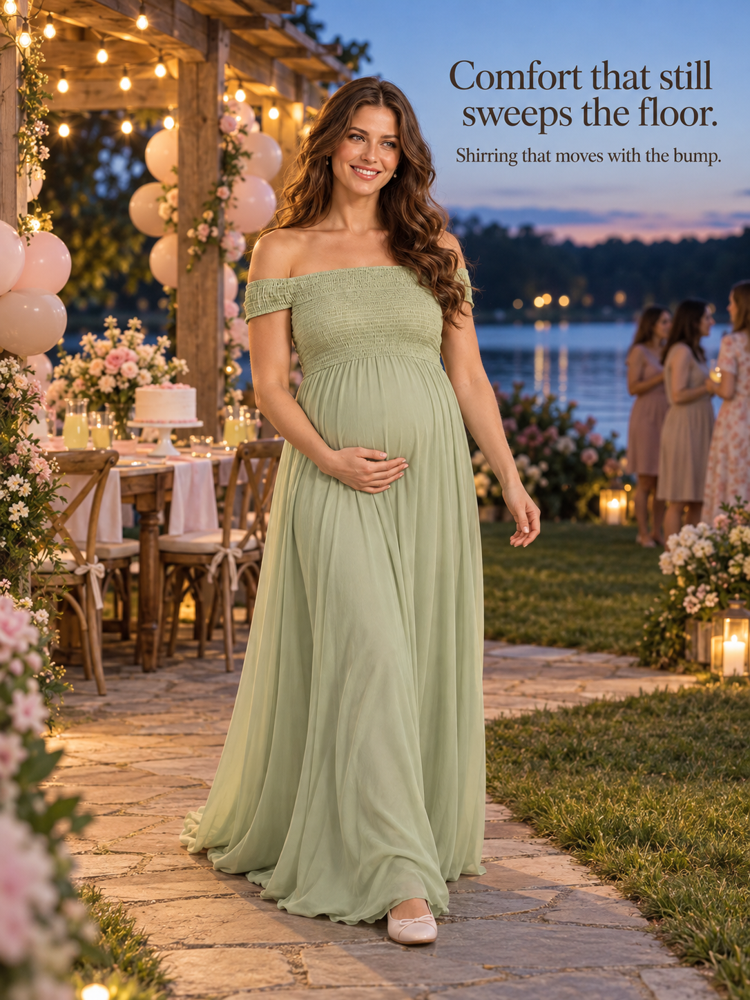 Iris Sage Green maternity dress — walking through a lakeside celebration at dusk