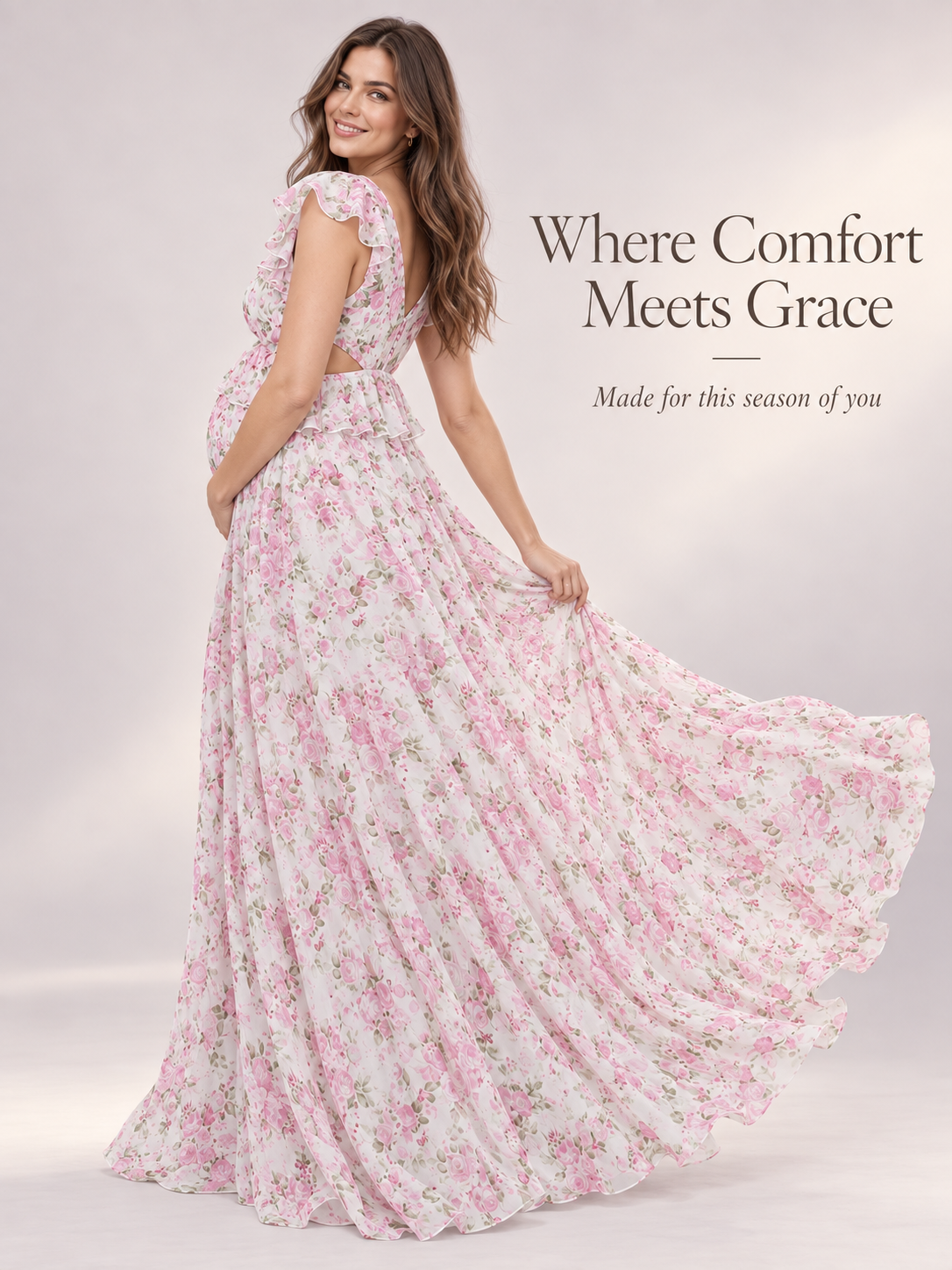 Dahlia Pink Floral maternity dress — turning with the full skirt swirling