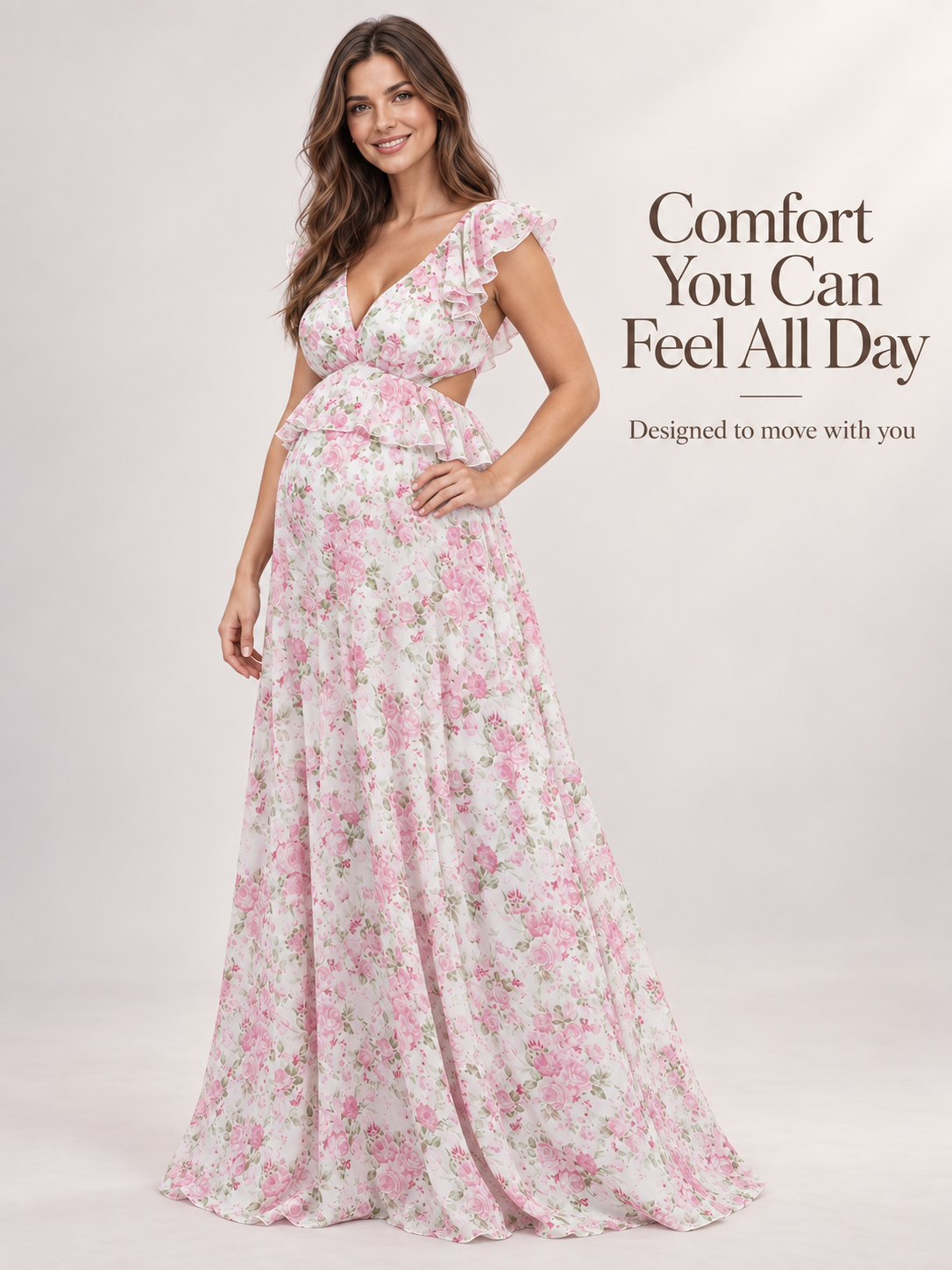 Dahlia Pink Floral maternity dress — standing portrait with a hand on the hip